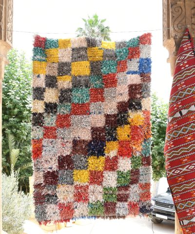 a colorful rug hanging on a wall. il_fullxfull.6028211624_qrhl.jpg