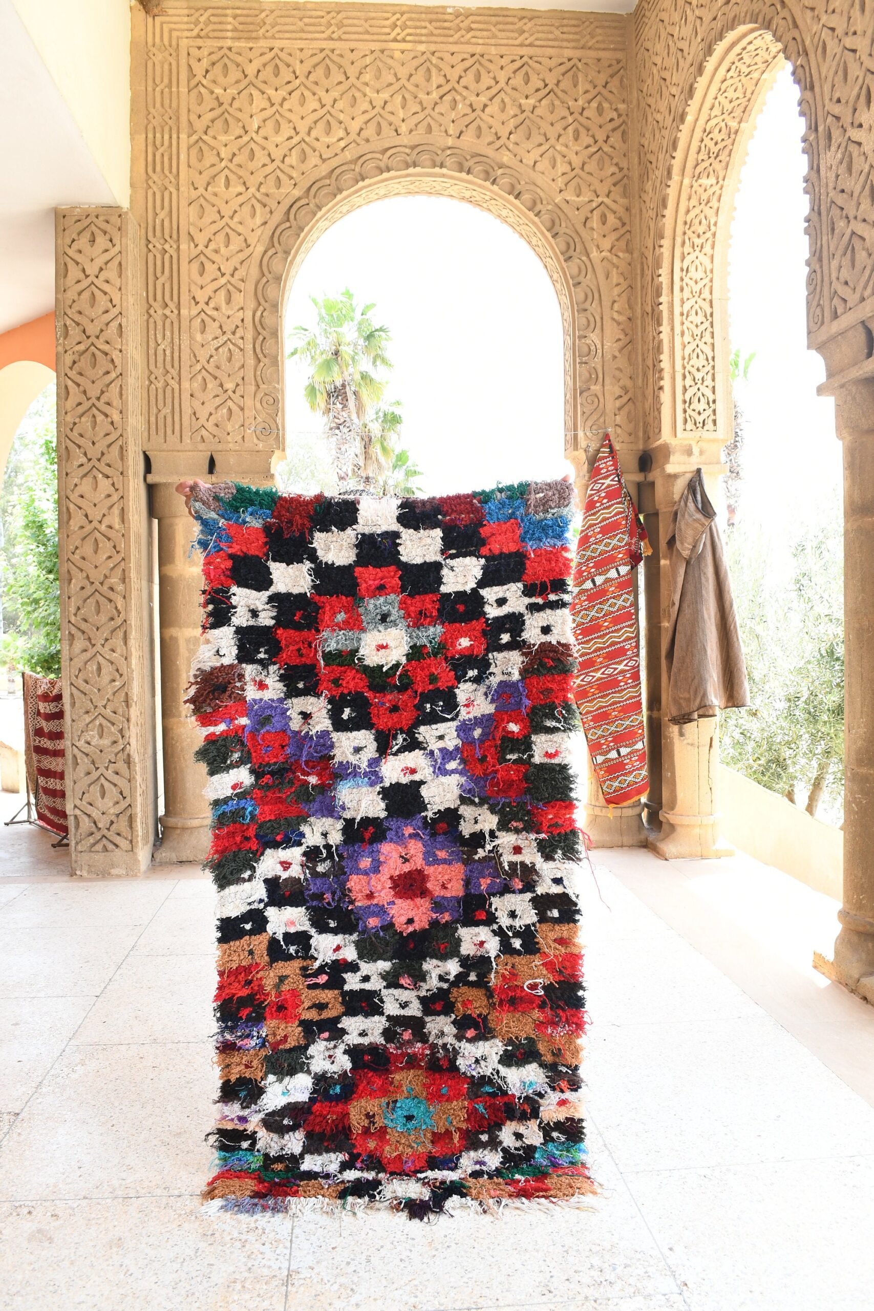 a colorful rug is on display in a room. il_fullxfull.6028227000_d7fu.jpg