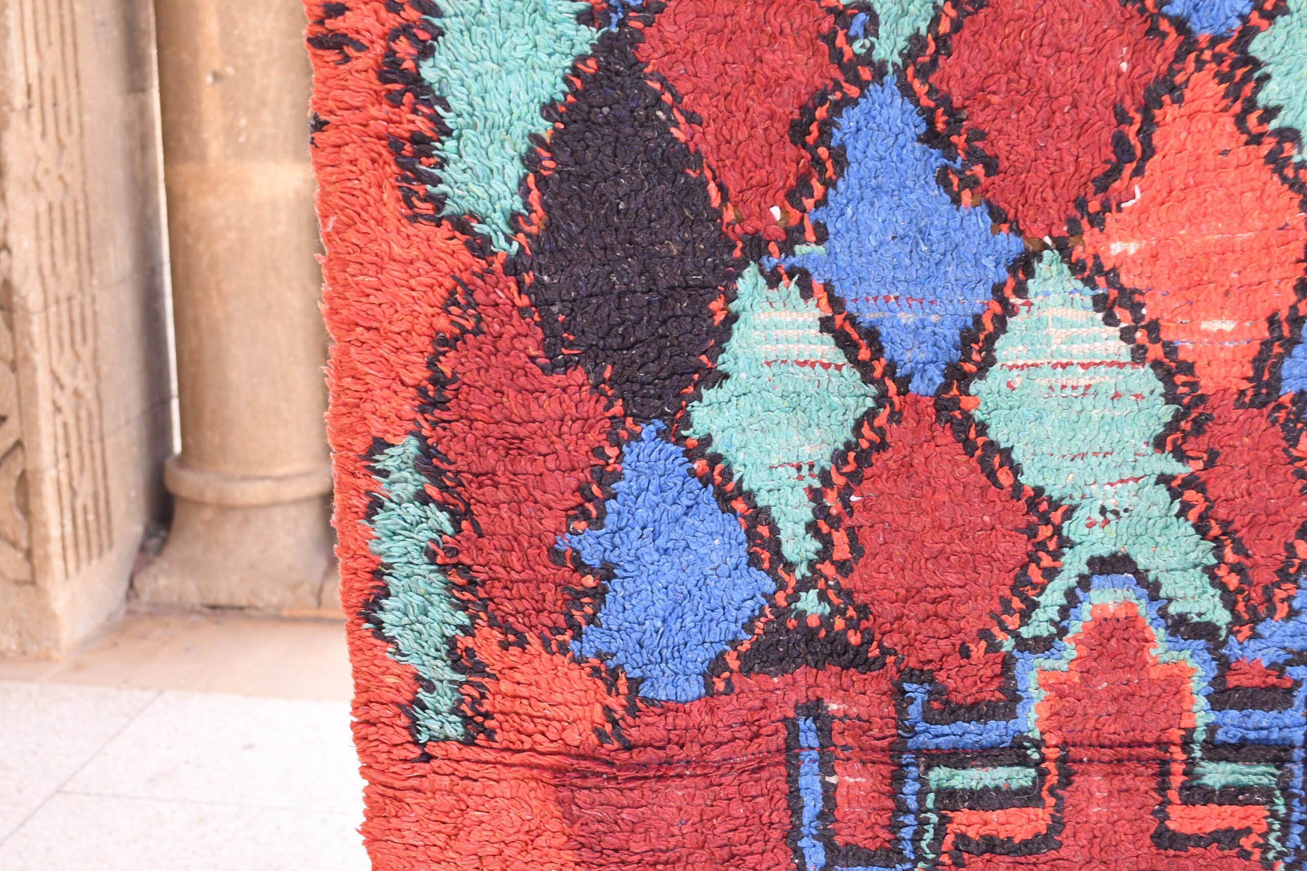 a cat sitting on a rug in a room. il_fullxfull.6028231930_58wu.jpg