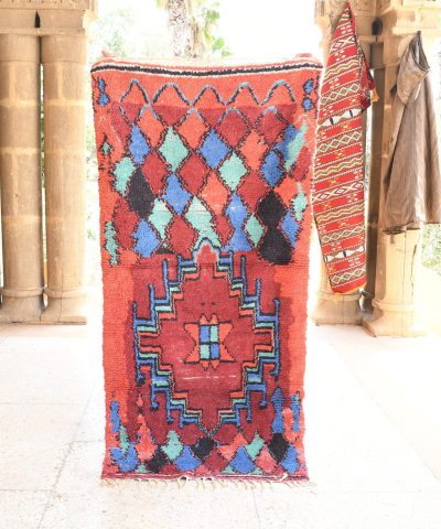 a colorful rug is on display in a room. il_fullxfull.6028232776_fqn4.jpg