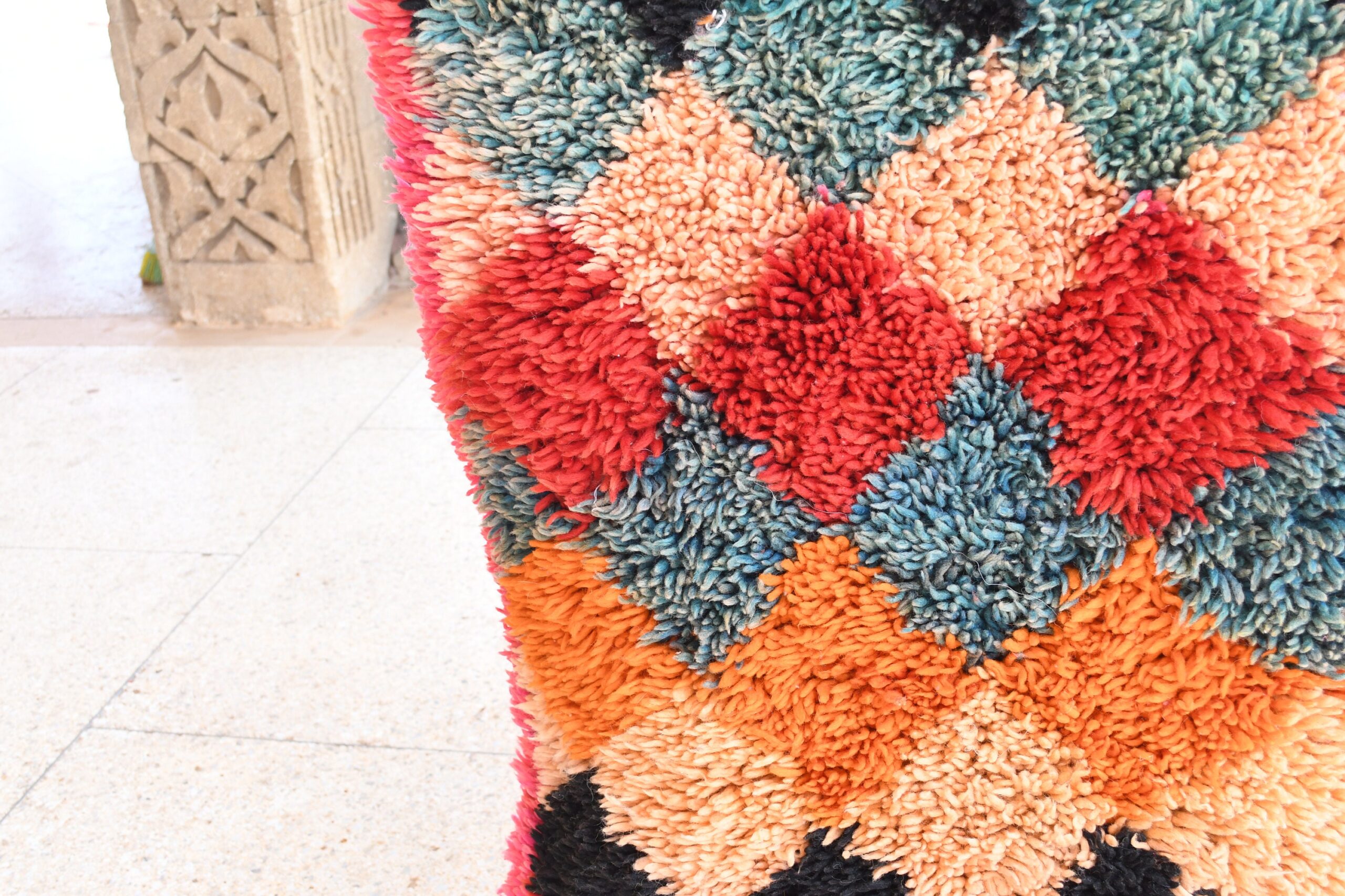 a colorful rug on the floor. il_fullxfull.6028235290_in7j.jpg