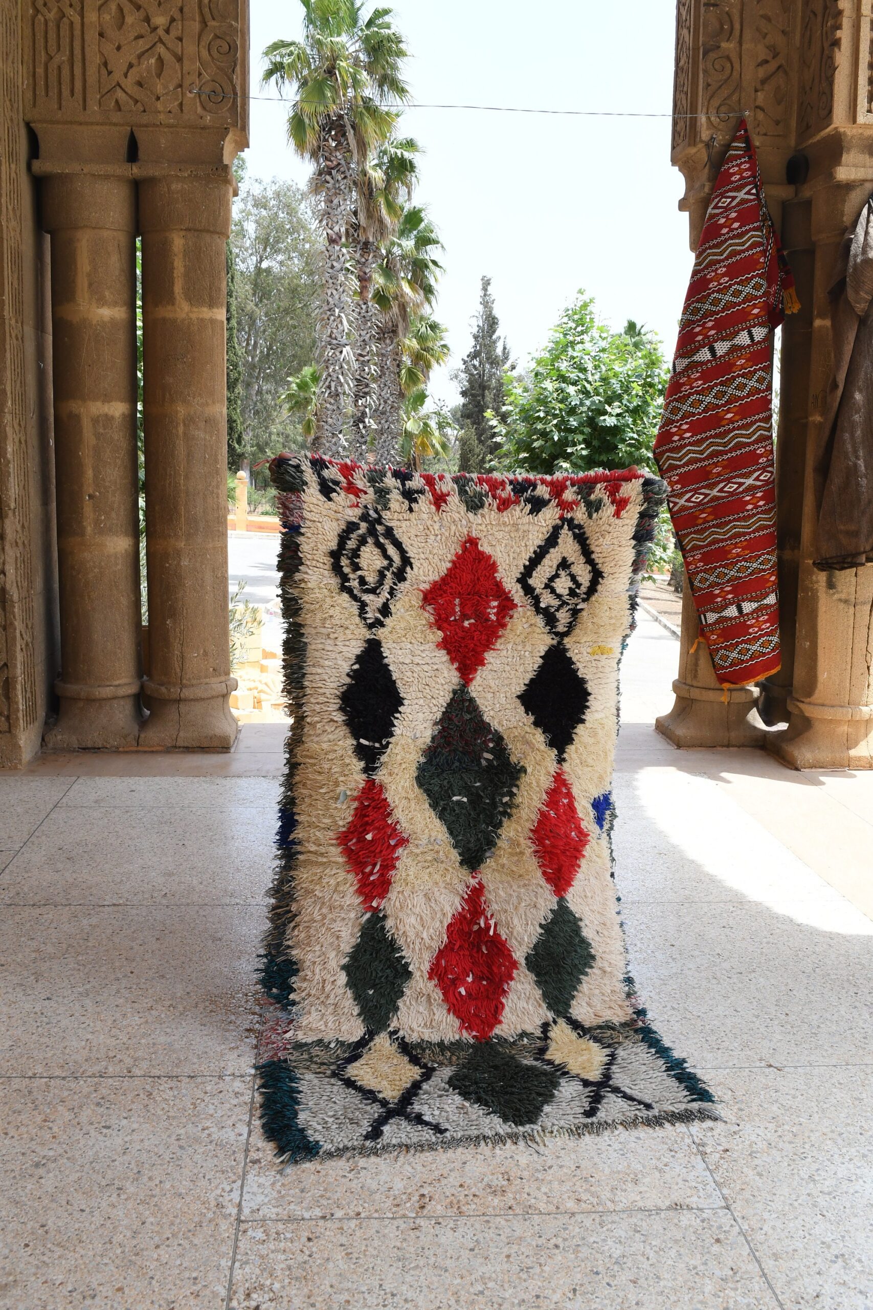 a rug is on the floor in a room. il_fullxfull.6028239724_1oco.jpg