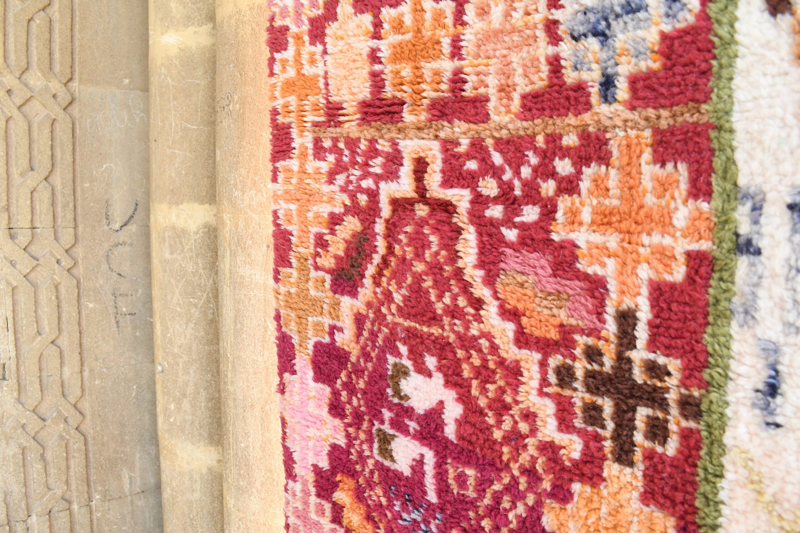 a rug is on the floor next to a wall. il_fullxfull.6035022220_8i8q.jpg