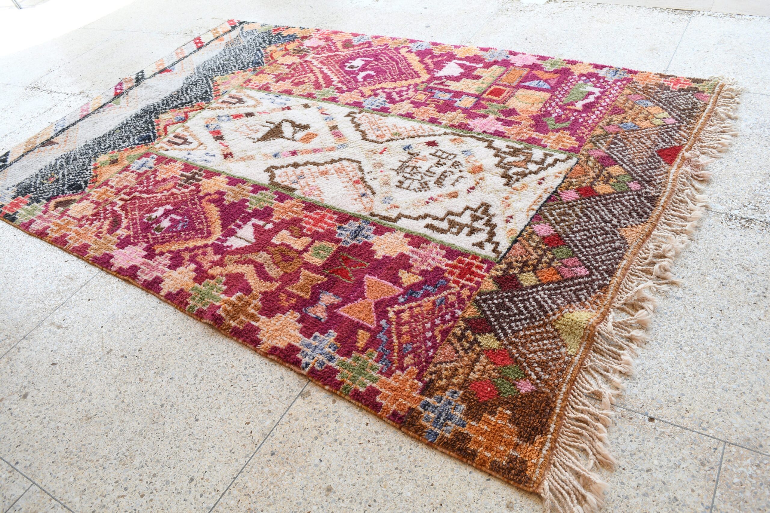 a colorful rug with fringes and fringes. il_fullxfull.6035022654_84nf.jpg