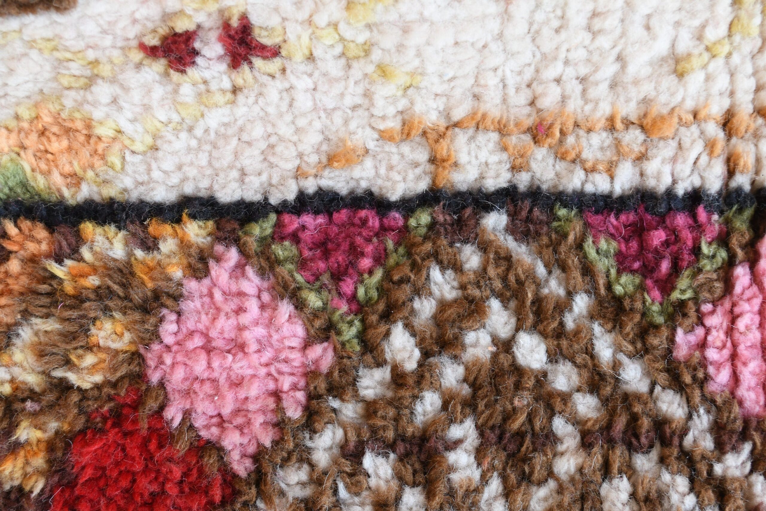 a close up of a rug with a flower pattern. il_fullxfull.6035022774_rrqv.jpg