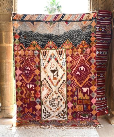 a colorful rug hanging on a wall. il_fullxfull.6035022894_7vm1.jpg