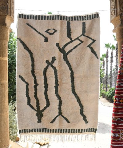 a rug hanging on a wall in a doorway. il_fullxfull.6035025388_2p50.jpg