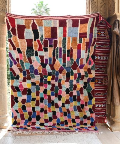 a colorful rug hanging on a wall. il_fullxfull.6035044208_da6h.jpg