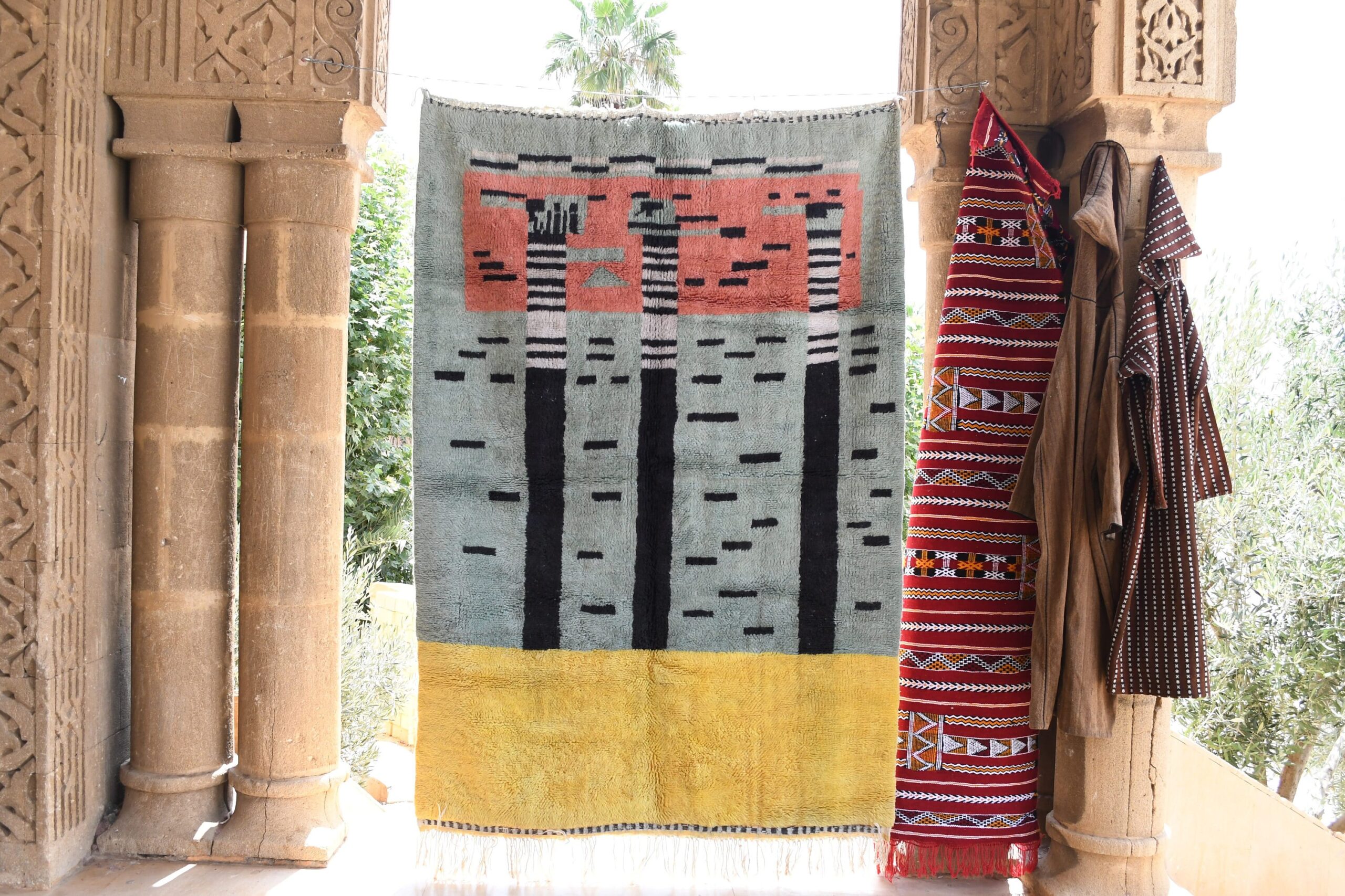 a colorful rug hanging on a wall. il_fullxfull.6035050344_k6j9.jpg