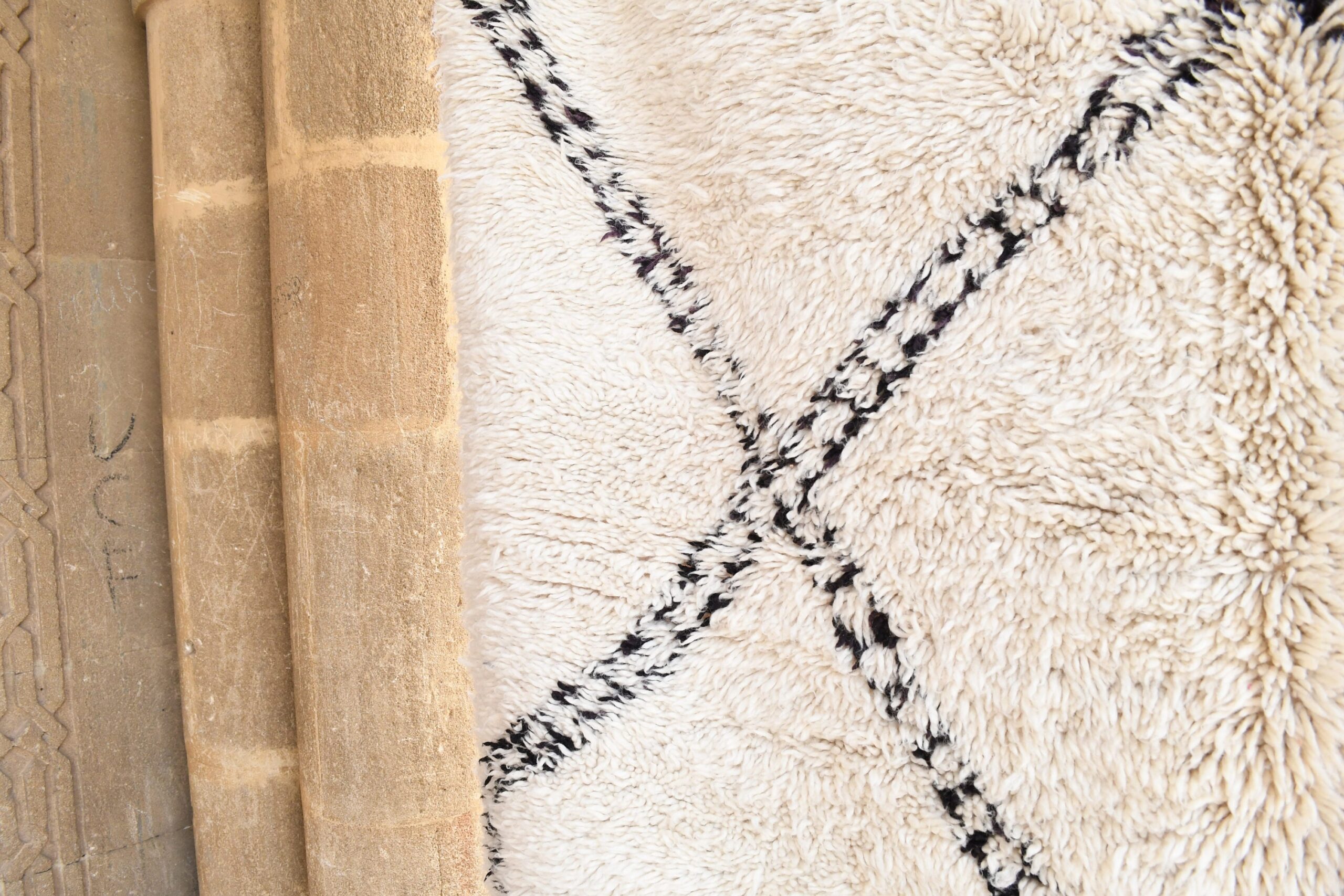 a white rug with black lines. il_fullxfull.6035057056_rr4g.jpg