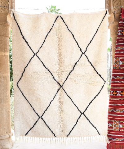 a rug hanging on a wall in a room. il_fullxfull.6035063350_9w4x.jpg