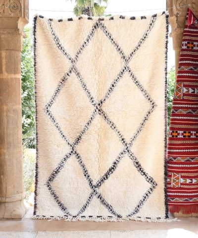 a white rug hanging on a wall. il_fullxfull.6035066316_qijg.jpg