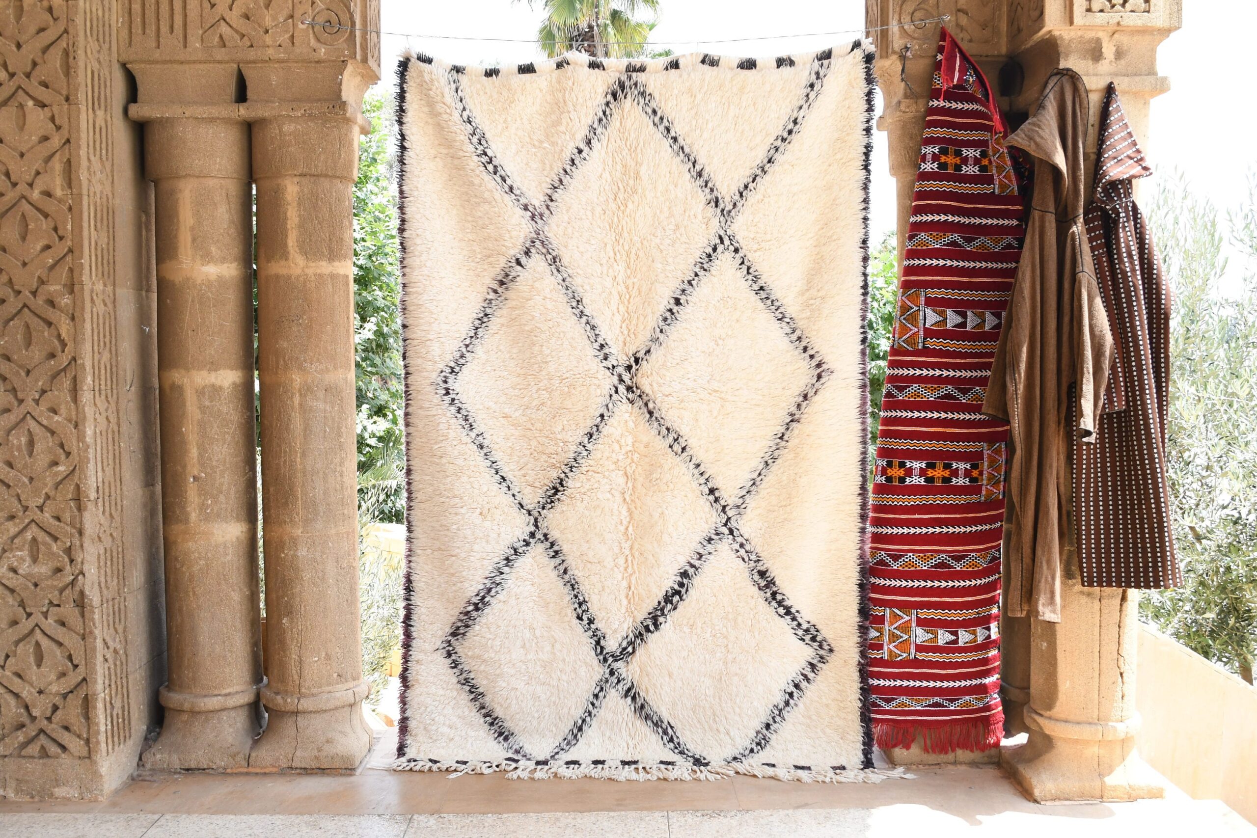 a white rug hanging on a wall. il_fullxfull.6035066316_qijg.jpg