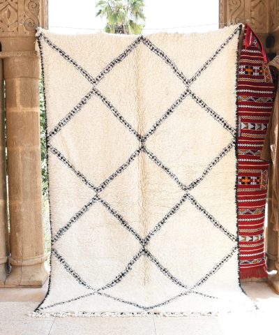 a rug is hanging on a wall. il_fullxfull.6035069228_nv75.jpg