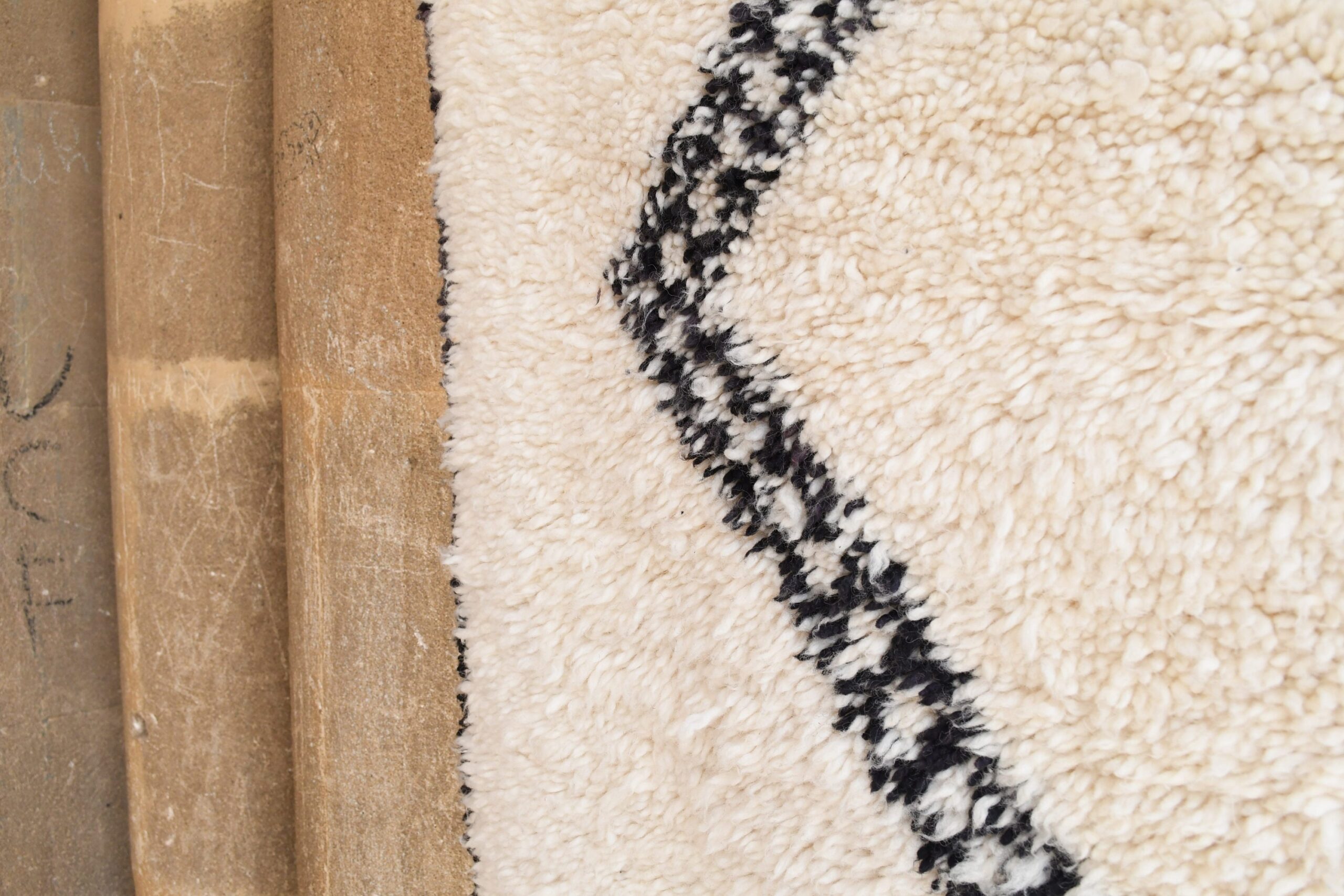 a black and white rug. il_fullxfull.6035070076_dwby.jpg