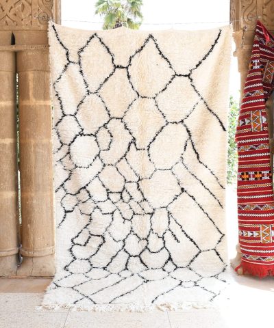 a room with a rug and a chair. il_fullxfull.6035073458_s6k7.jpg