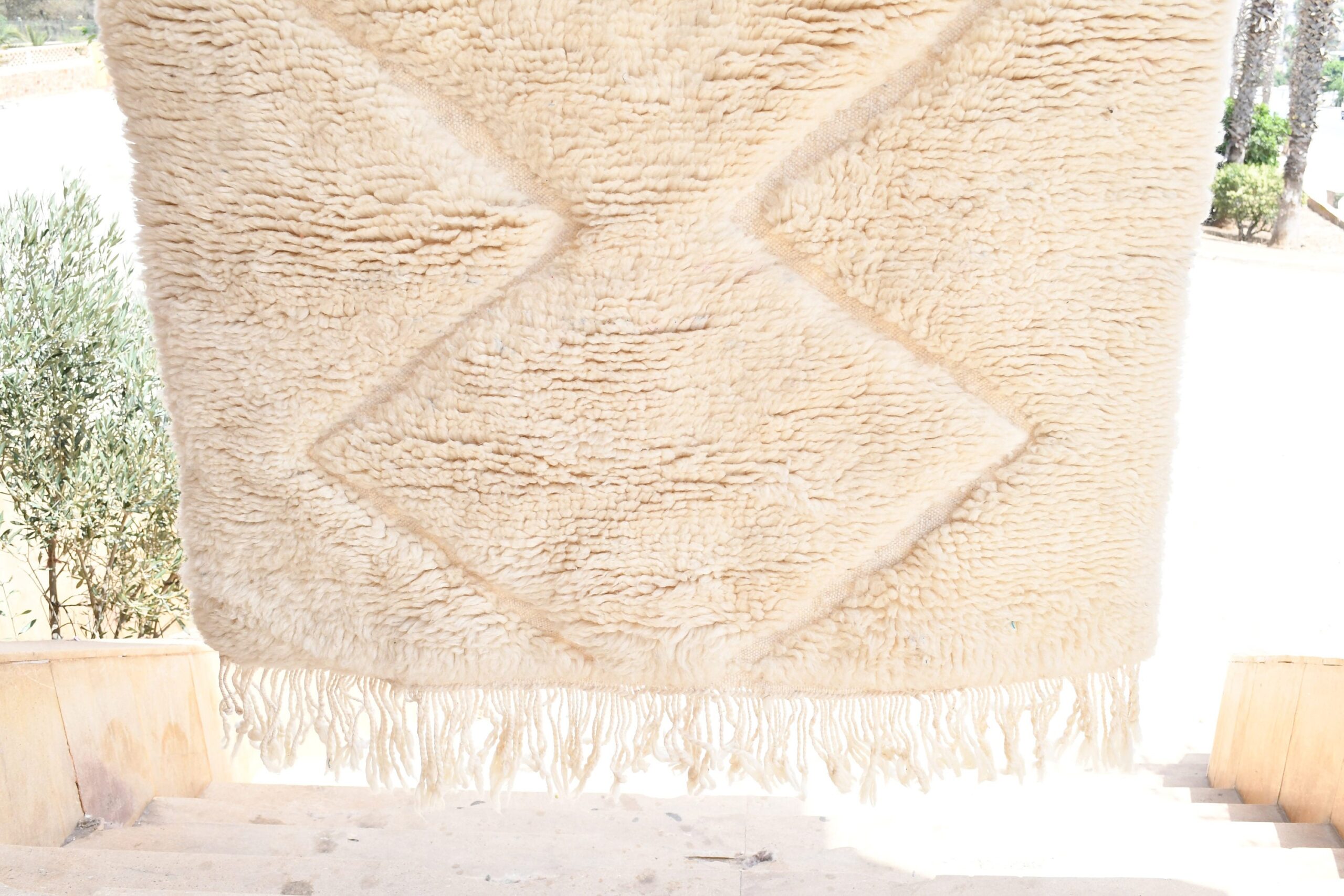 a large rug with a diamond pattern. il_fullxfull.6035078620_rxj4-1.jpg