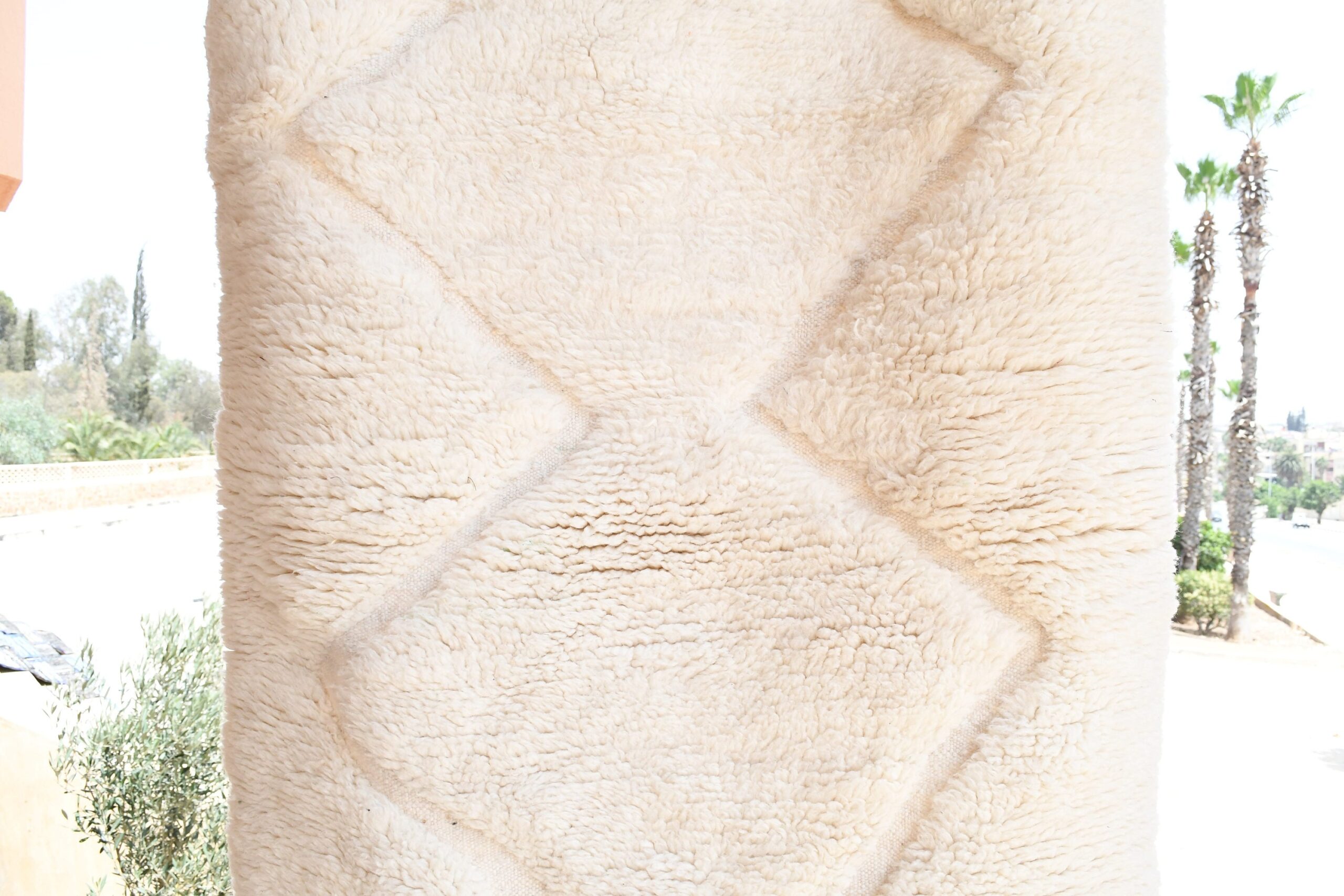 a man in a suit and tie standing next to a tall stone pillar. il_fullxfull.6035080106_mqbf.jpg