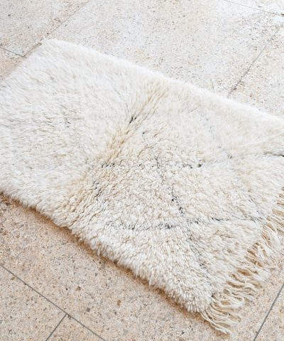 a white rug on the floor. il_fullxfull.6035084736_67o8.jpg