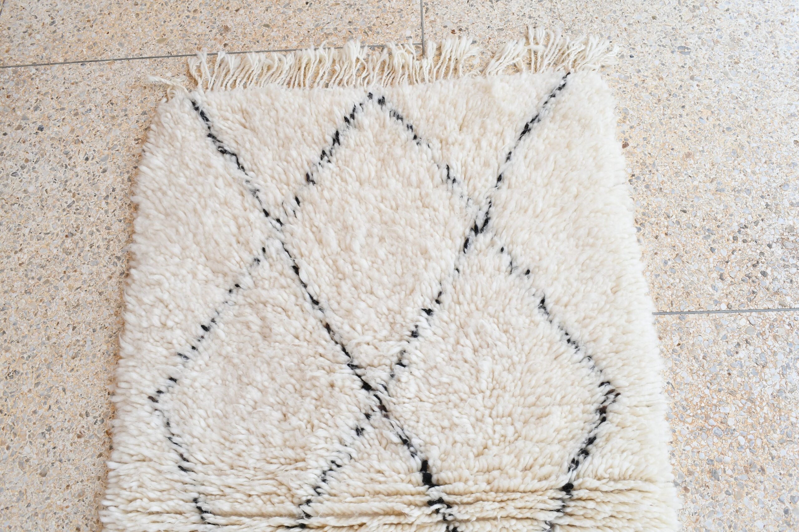 a rug on the floor. il_fullxfull.6035085836_1o0q.jpg