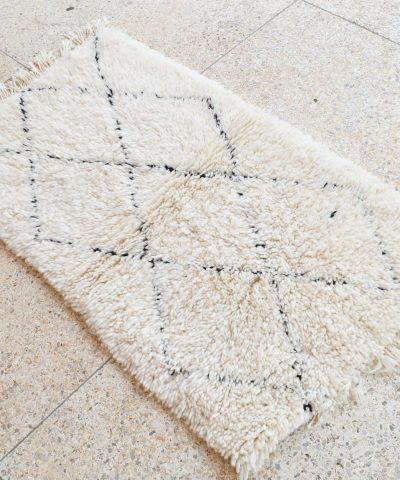 a white rug on the floor. il_fullxfull.6035086520_g94c.jpg