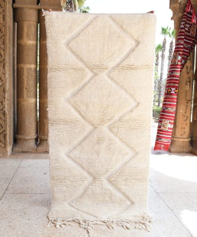 a tall white vase sitting on a tiled floor. il_fullxfull.6035089698_3u5z.jpg