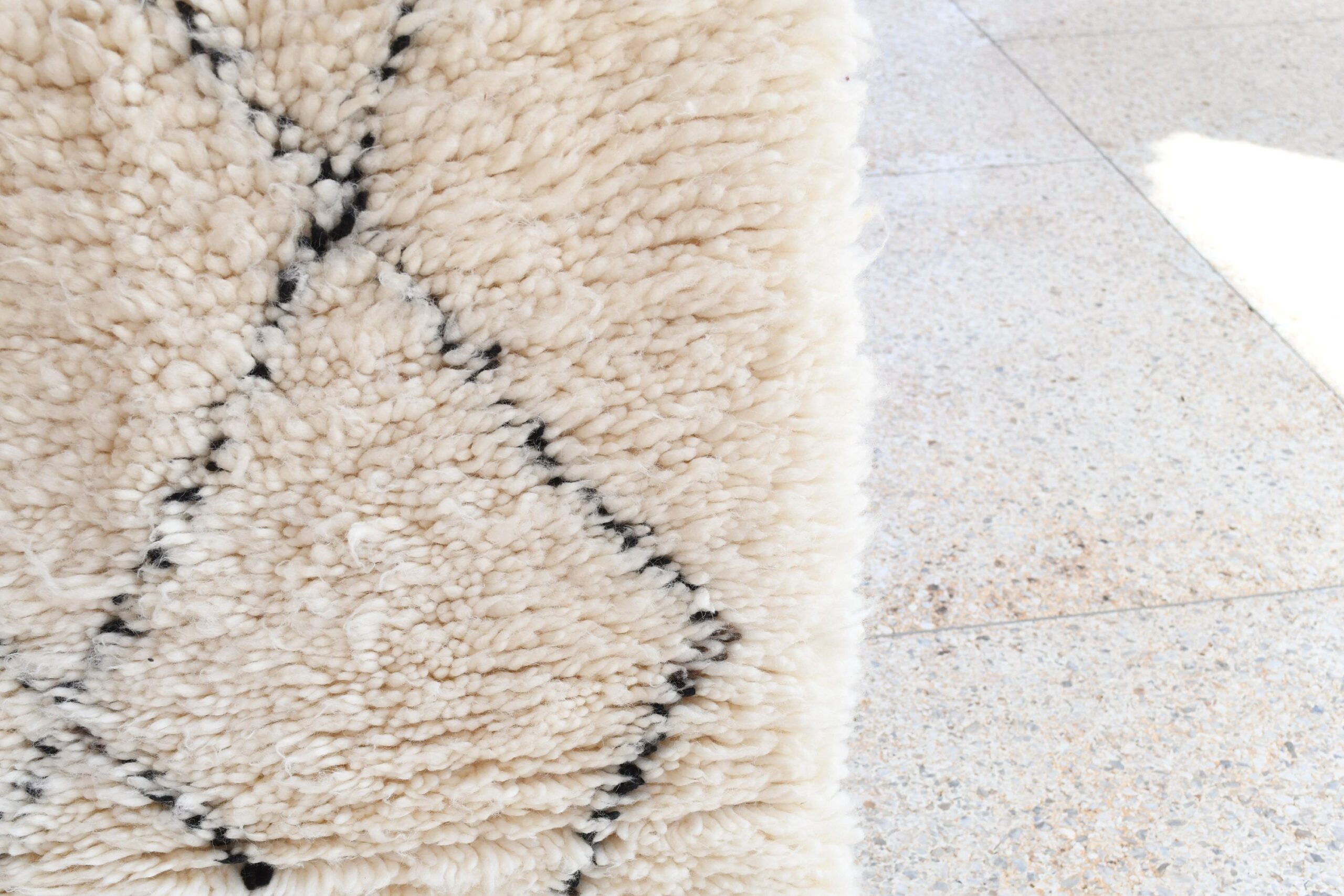 a cat is laying on a rug on the floor. il_fullxfull.6035090392_p6y9.jpg