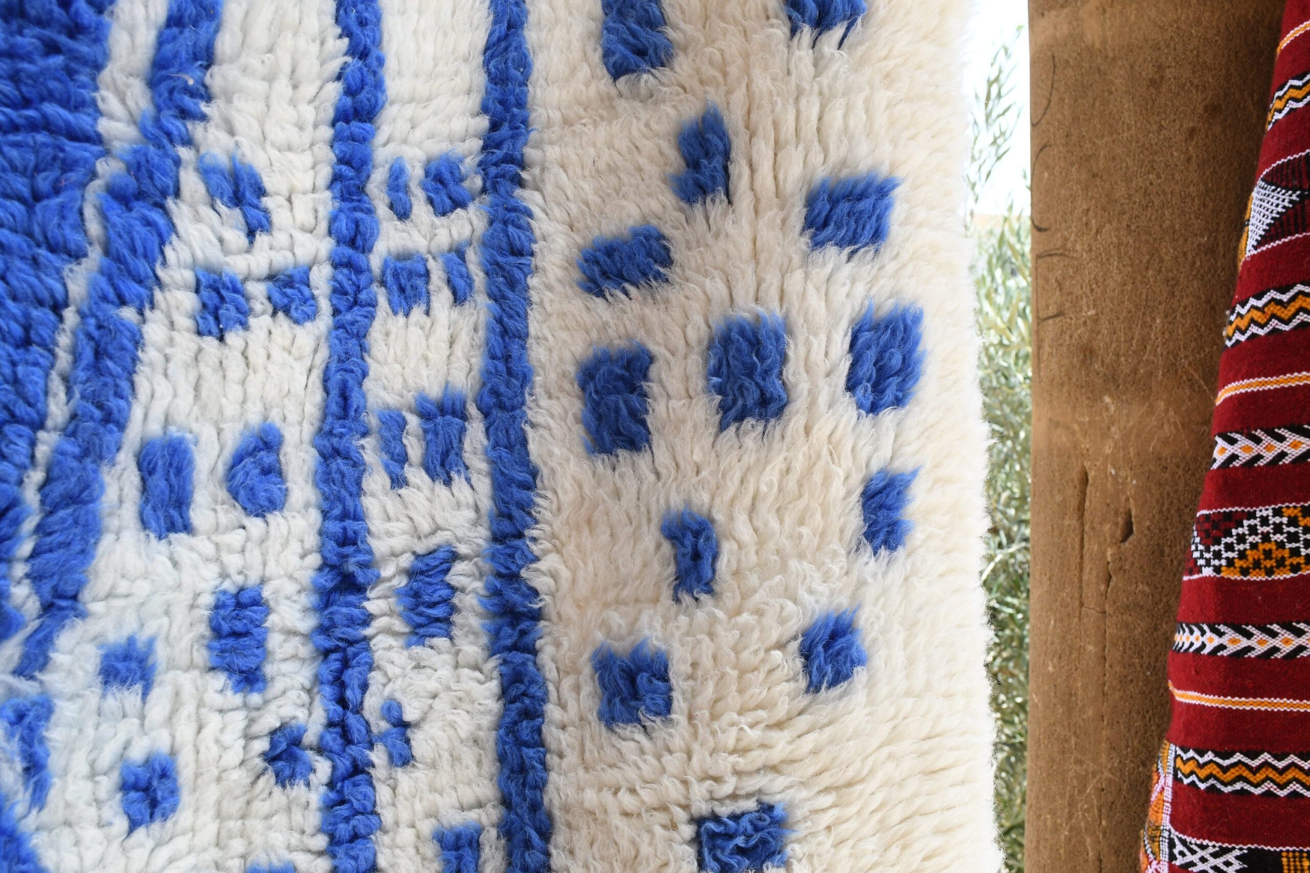 a moroccan rug with blue and white designs. il_fullxfull.6035092054_746l.jpg