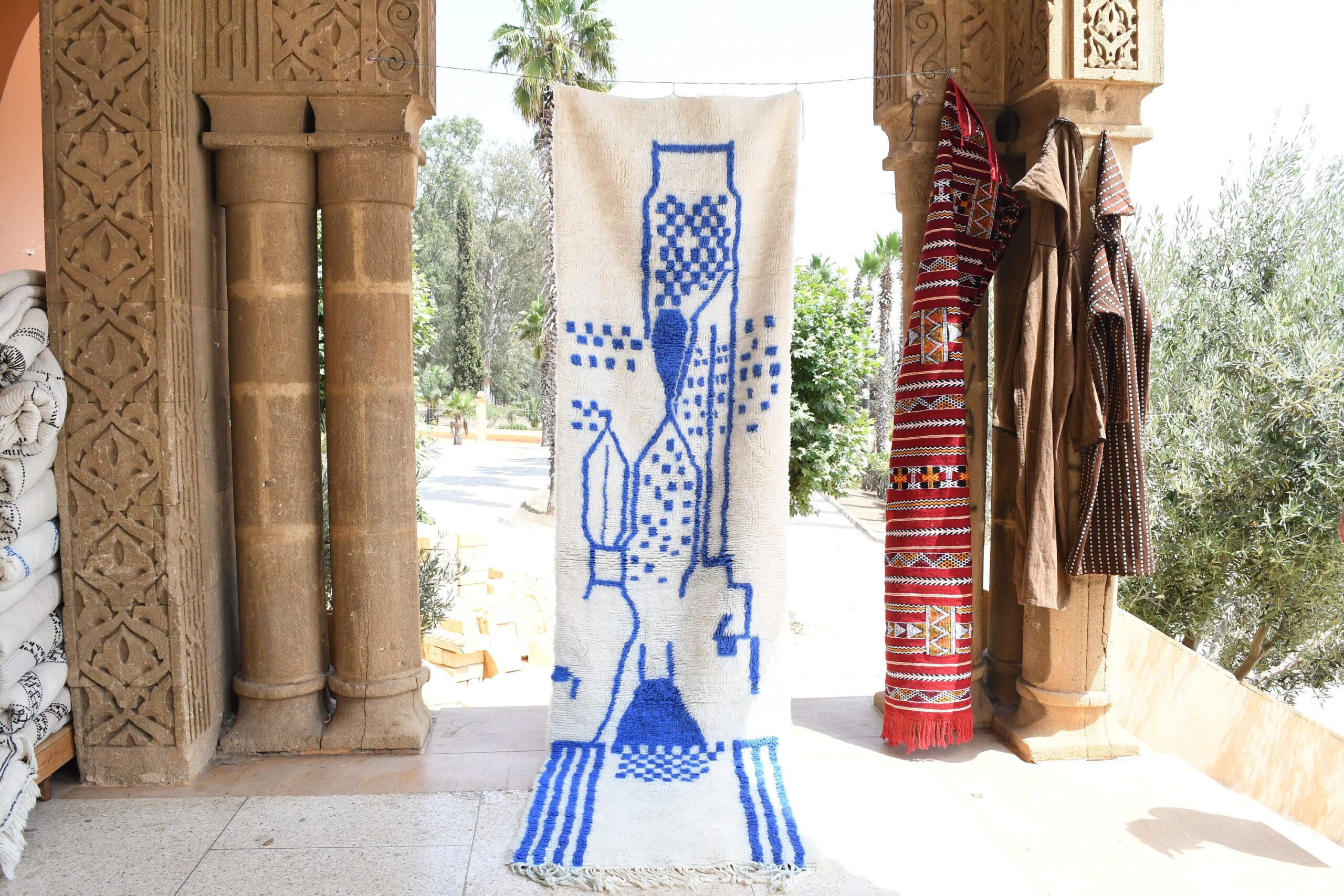 a blue and white vase sitting on a floor. il_fullxfull.6035092848_ma4q.jpg