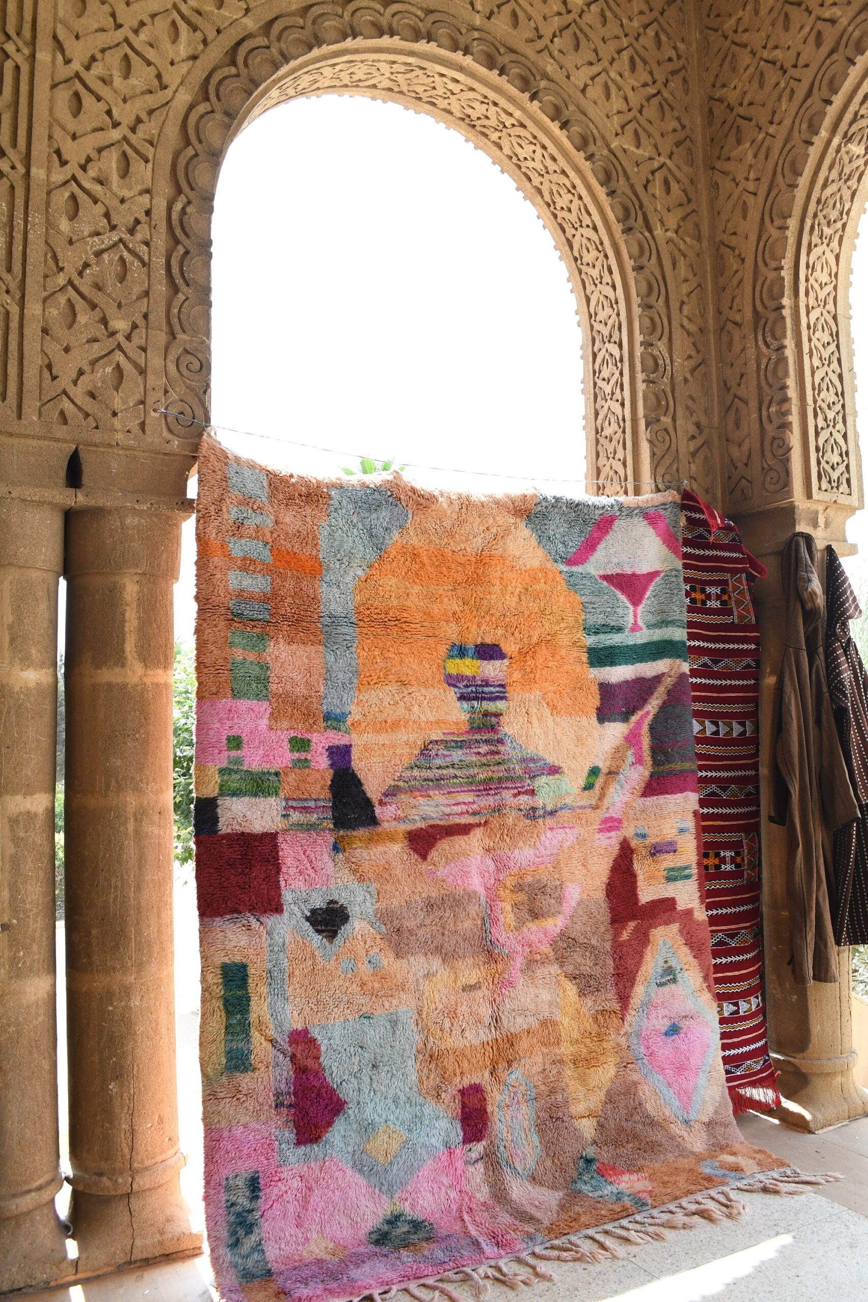 a colorful rug is on display in a room. il_fullxfull.6036481152_nb44.jpg