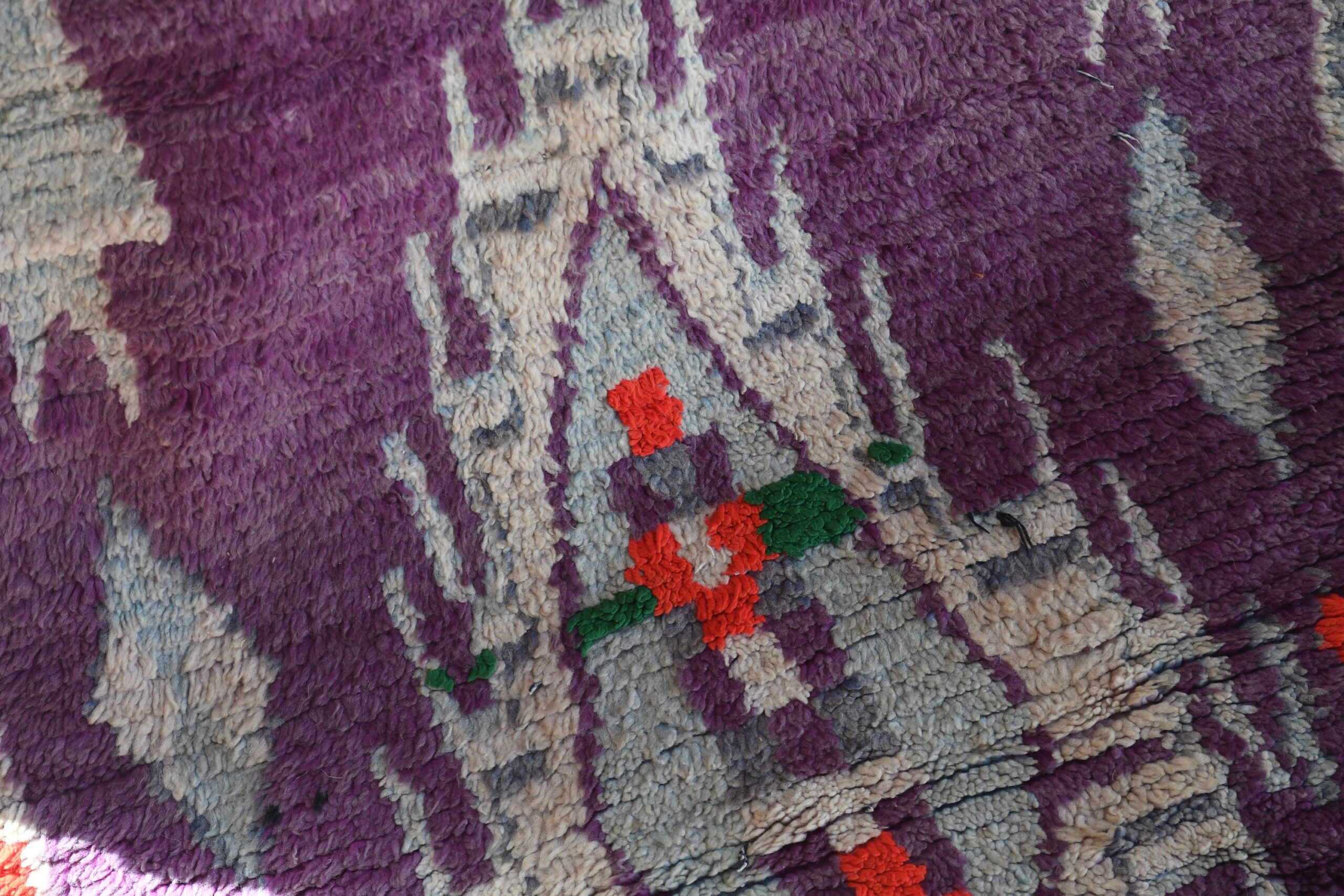 a purple and red rug with a pattern. il_fullxfull.6065245103_rc06.jpg