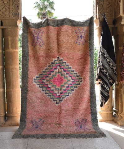 a rug hanging on a wall in a room. il_fullxfull.6065246437_65g9.jpg