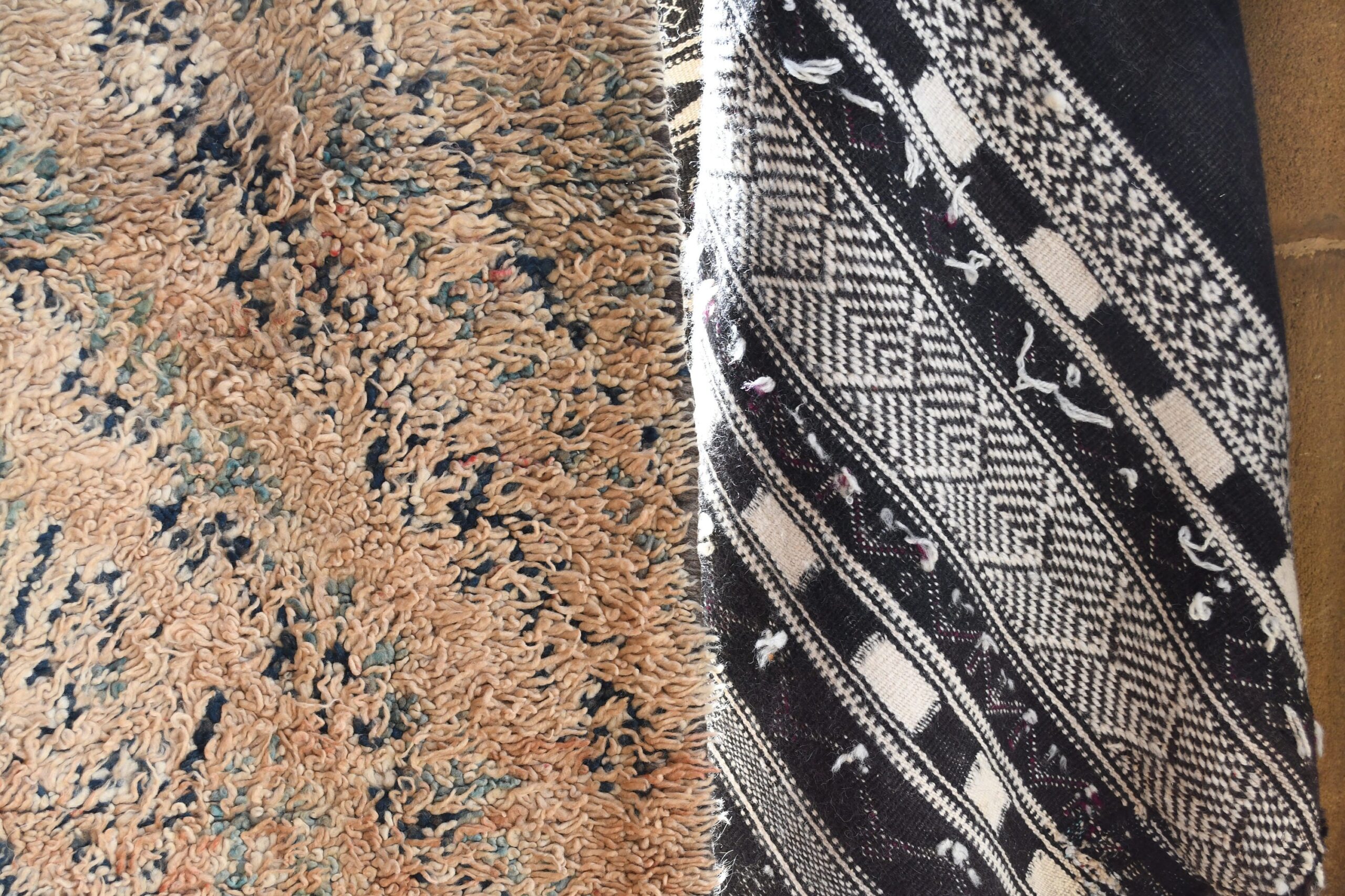 a rug with a black and white pattern. il_fullxfull.6065247909_m5r9.jpg