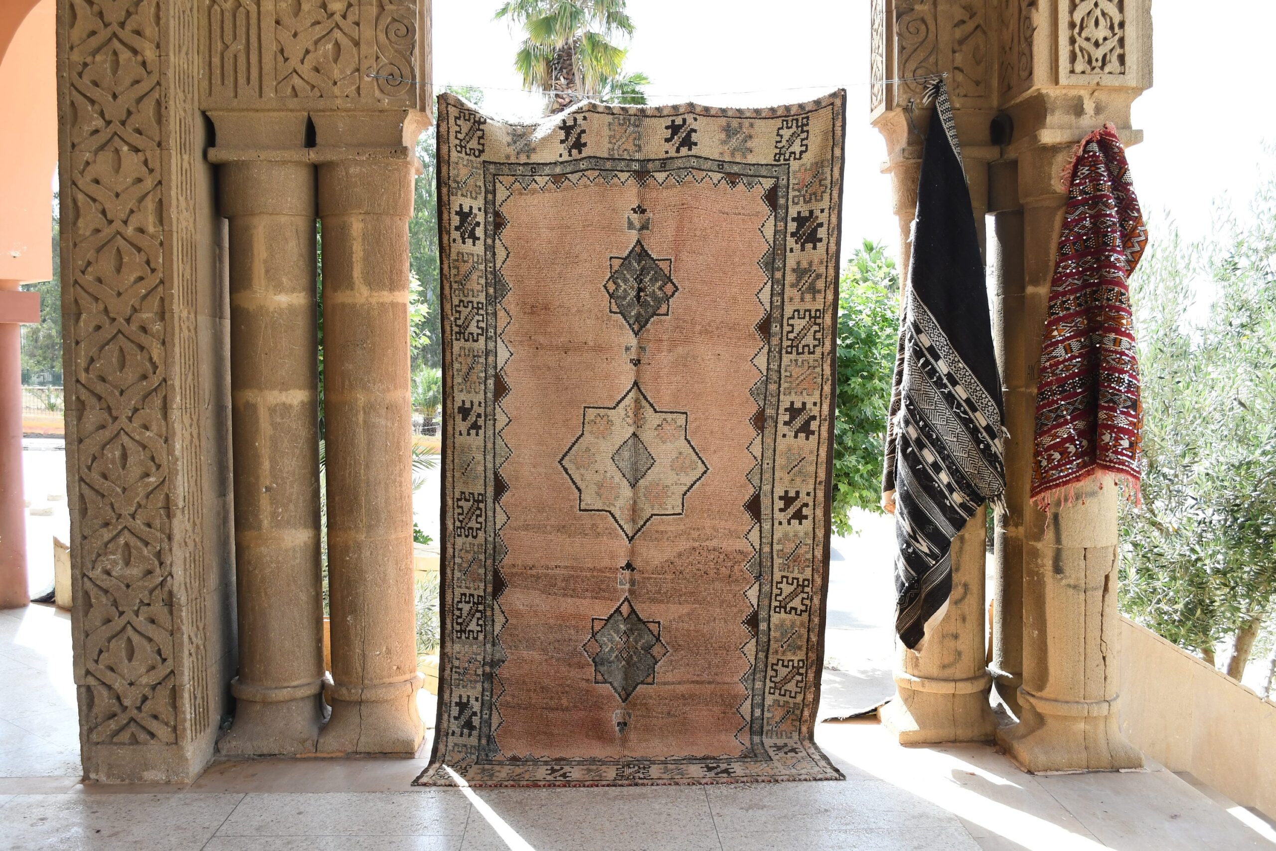 a large rug is on display in a room. il_fullxfull.6065251311_r29l.jpg
