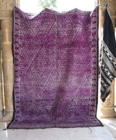 a purple rug hanging on a wall. il_fullxfull.6065255149_o28t.jpg
