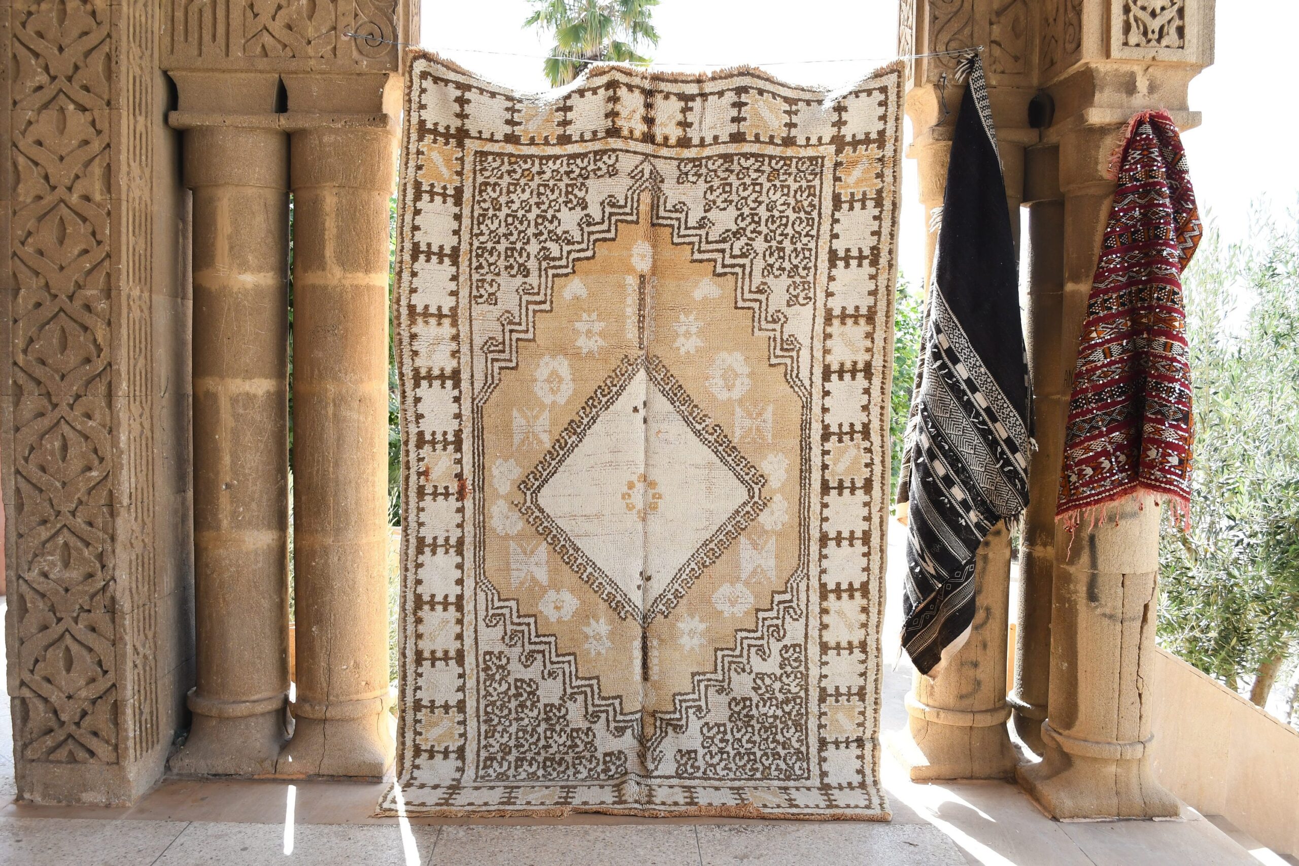 a door with a rug hanging on it. il_fullxfull.6065257519_2ebs.jpg