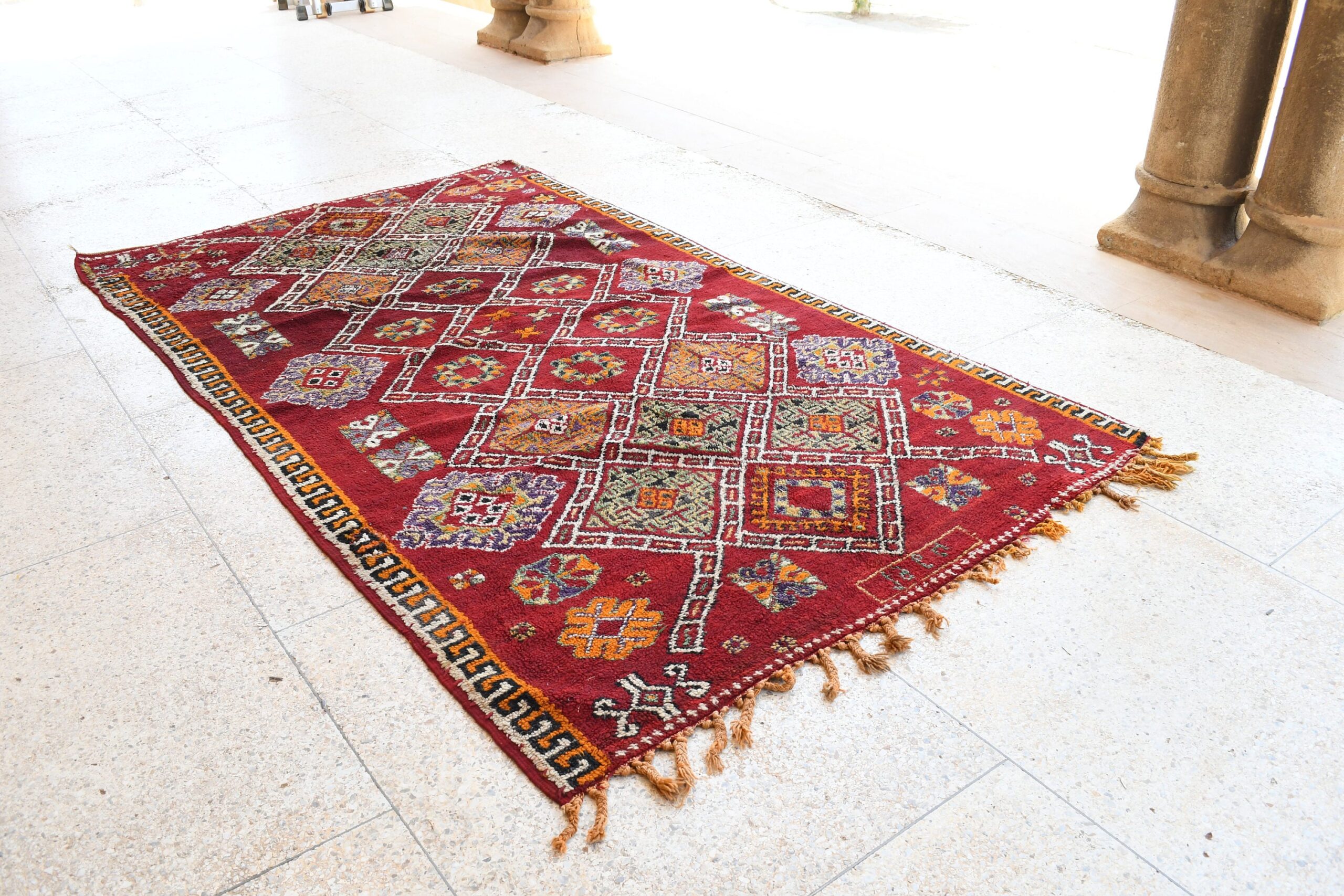 a red rug with a pattern on it. il_fullxfull.6065271197_emft.jpg