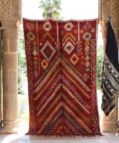 a red rug hanging on a wall. il_fullxfull.6065271993_b4f3.jpg