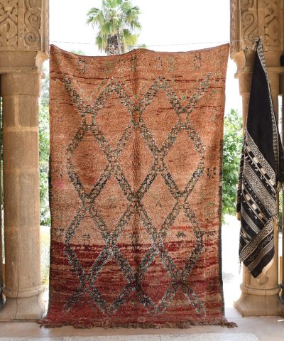 a rug hanging on a wall in a room. il_fullxfull.6065520823_tqqq.jpg