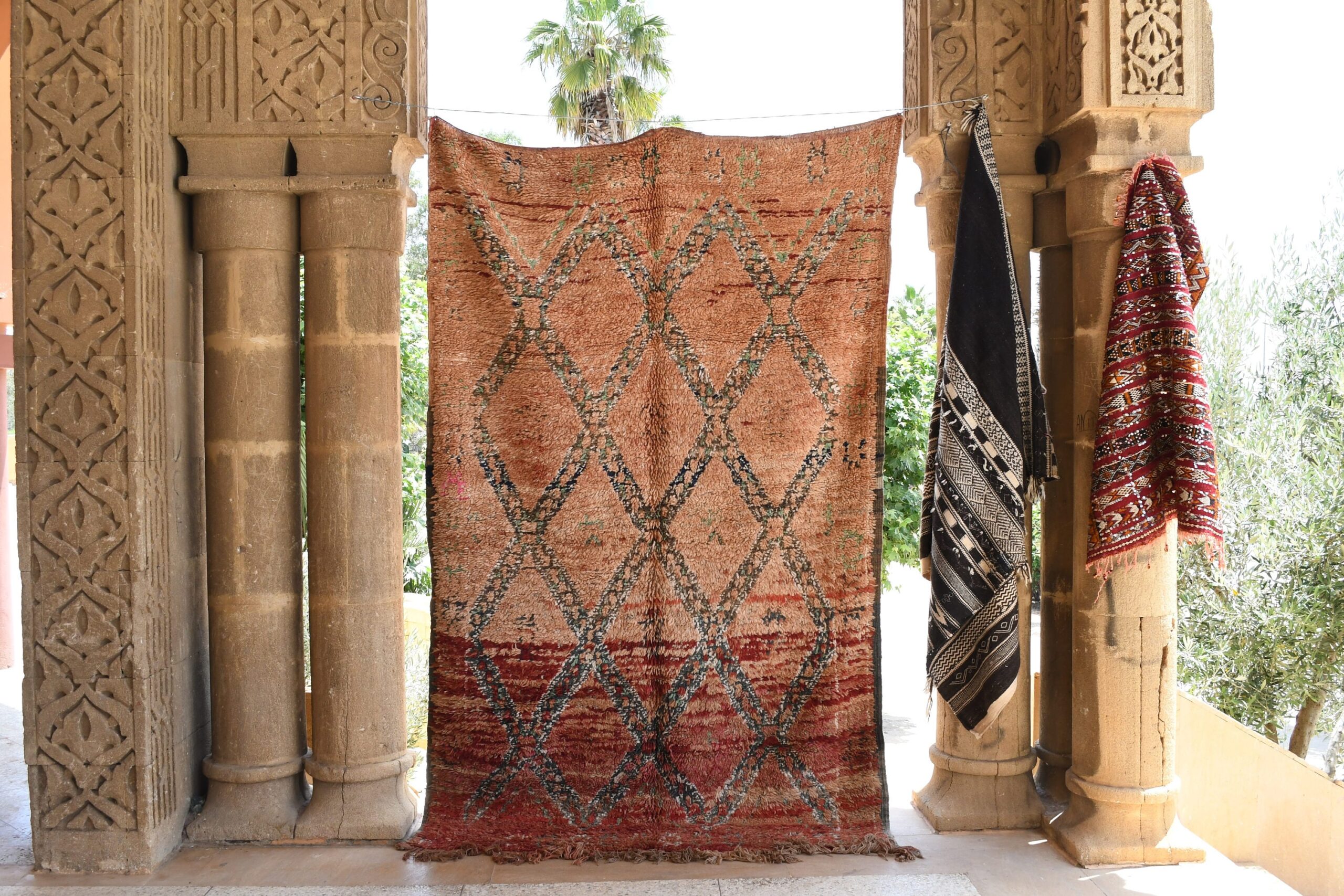 a rug hanging on a wall in a room. il_fullxfull.6065520823_tqqq.jpg