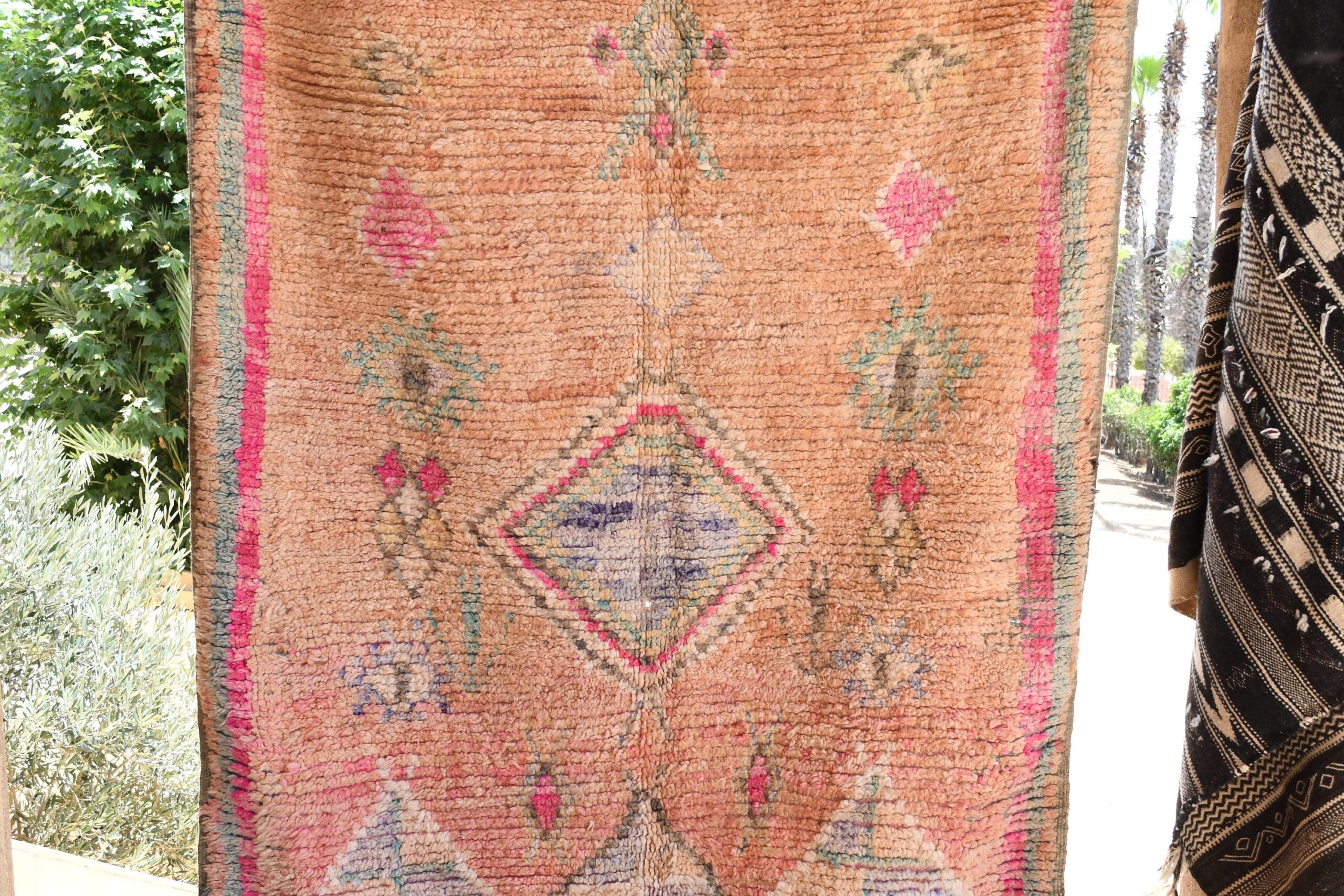 a rug hanging on a wall. il_fullxfull.6065523079_7o7w.jpg
