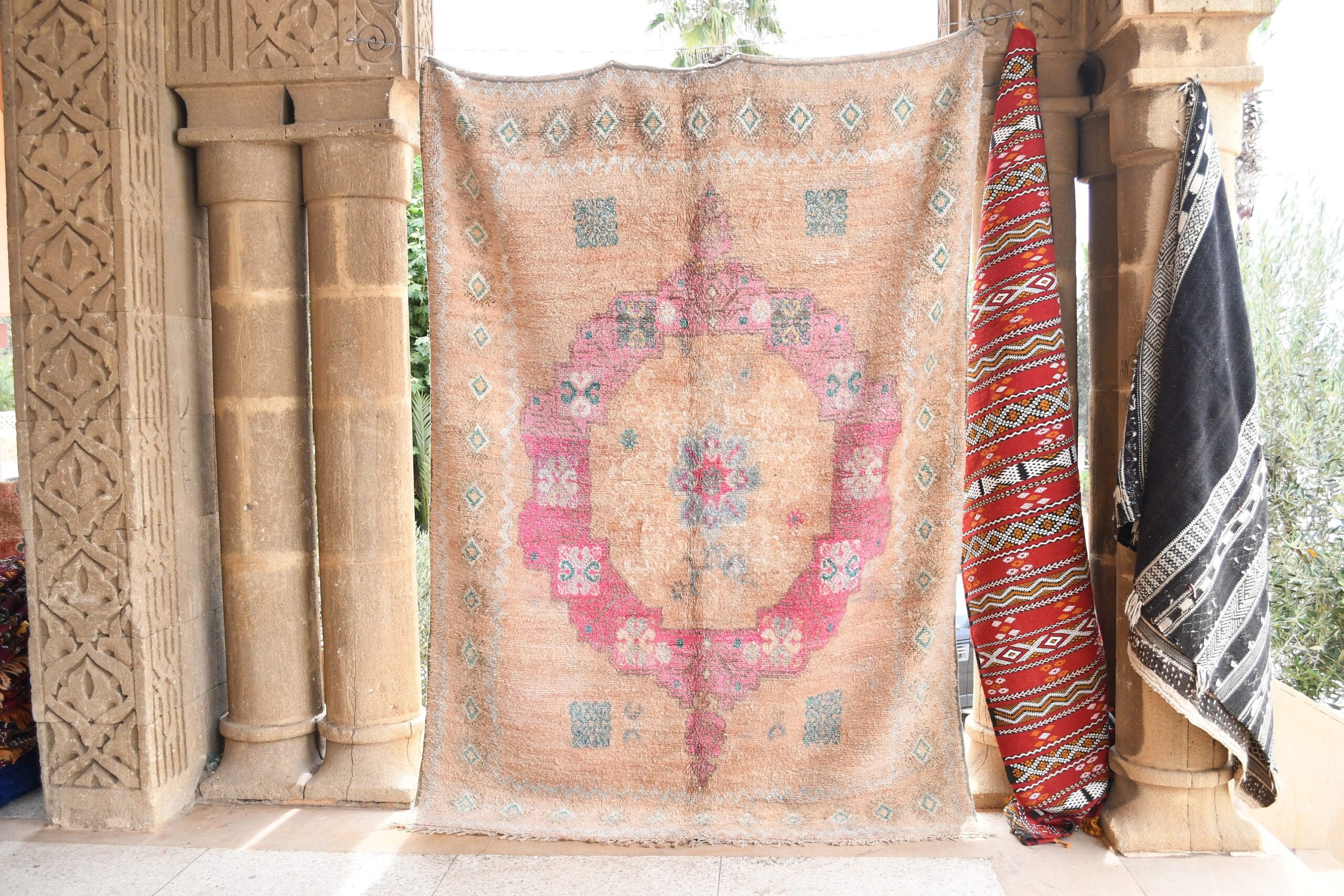 a rug hanging on a wall in a room. il_fullxfull.6065535347_2i6x.jpg