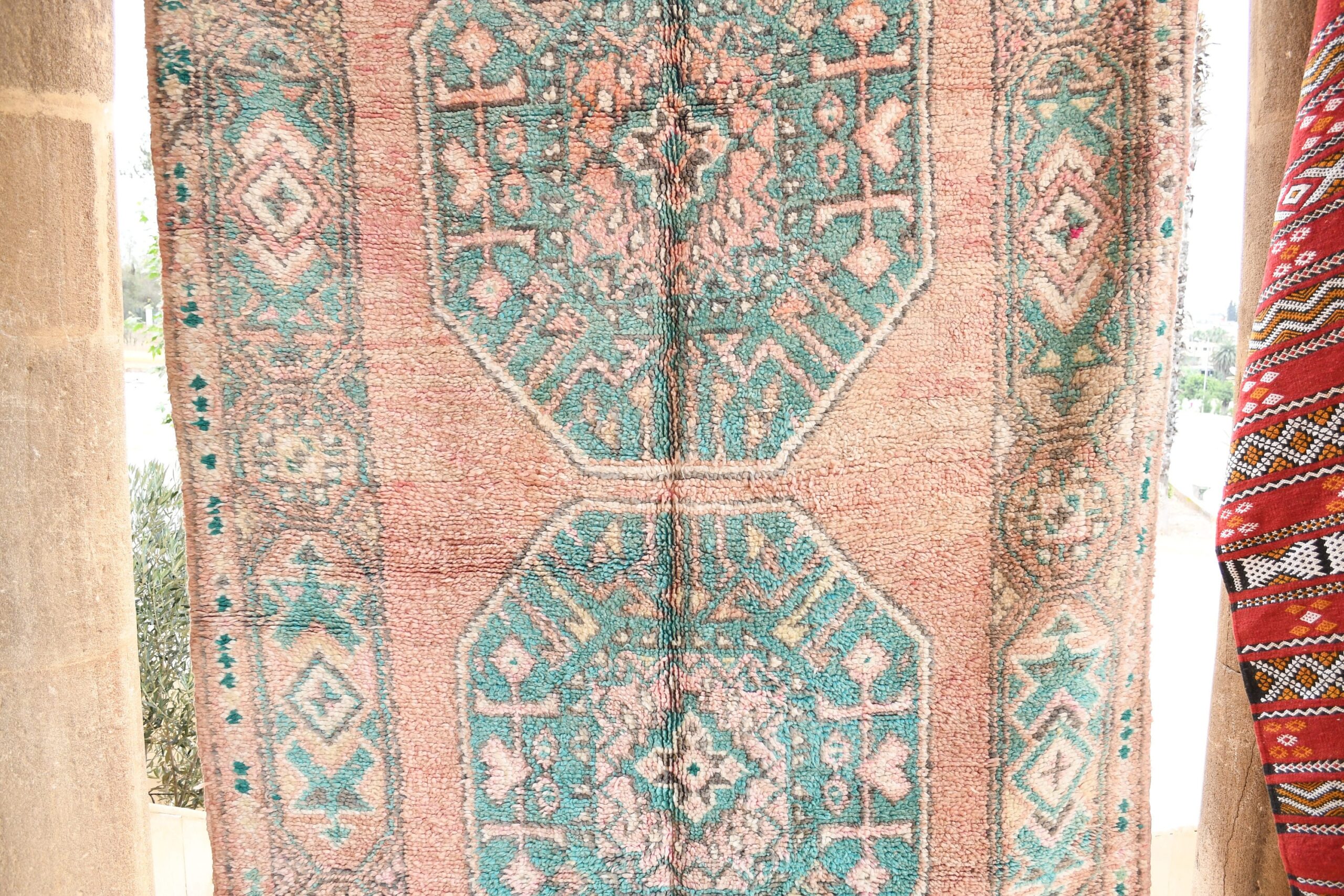 a rug hanging on a wall. il_fullxfull.6065542045_o4vf.jpg