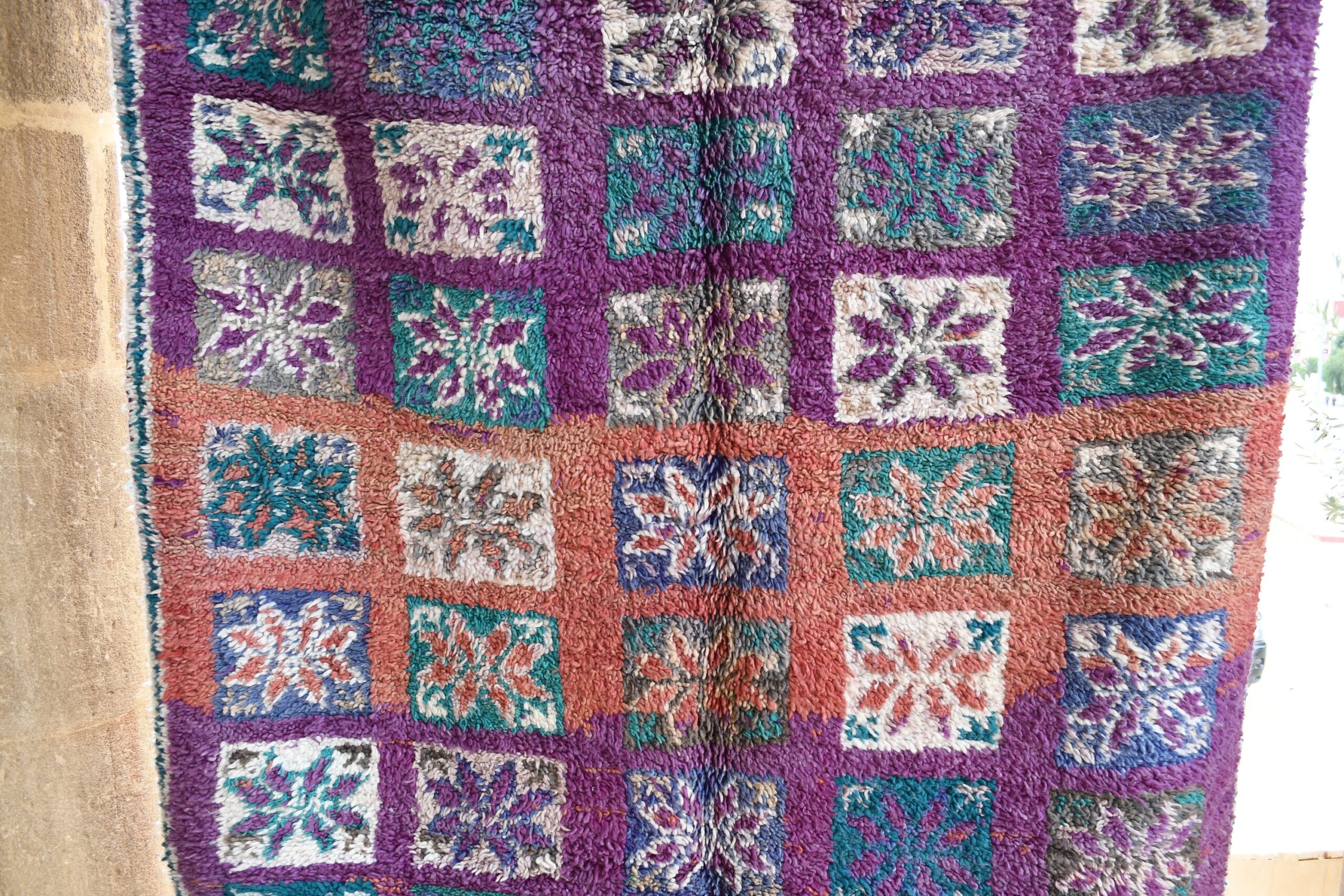 a purple and blue rug with a patchwork pattern. il_fullxfull.6065550769_hx25.jpg