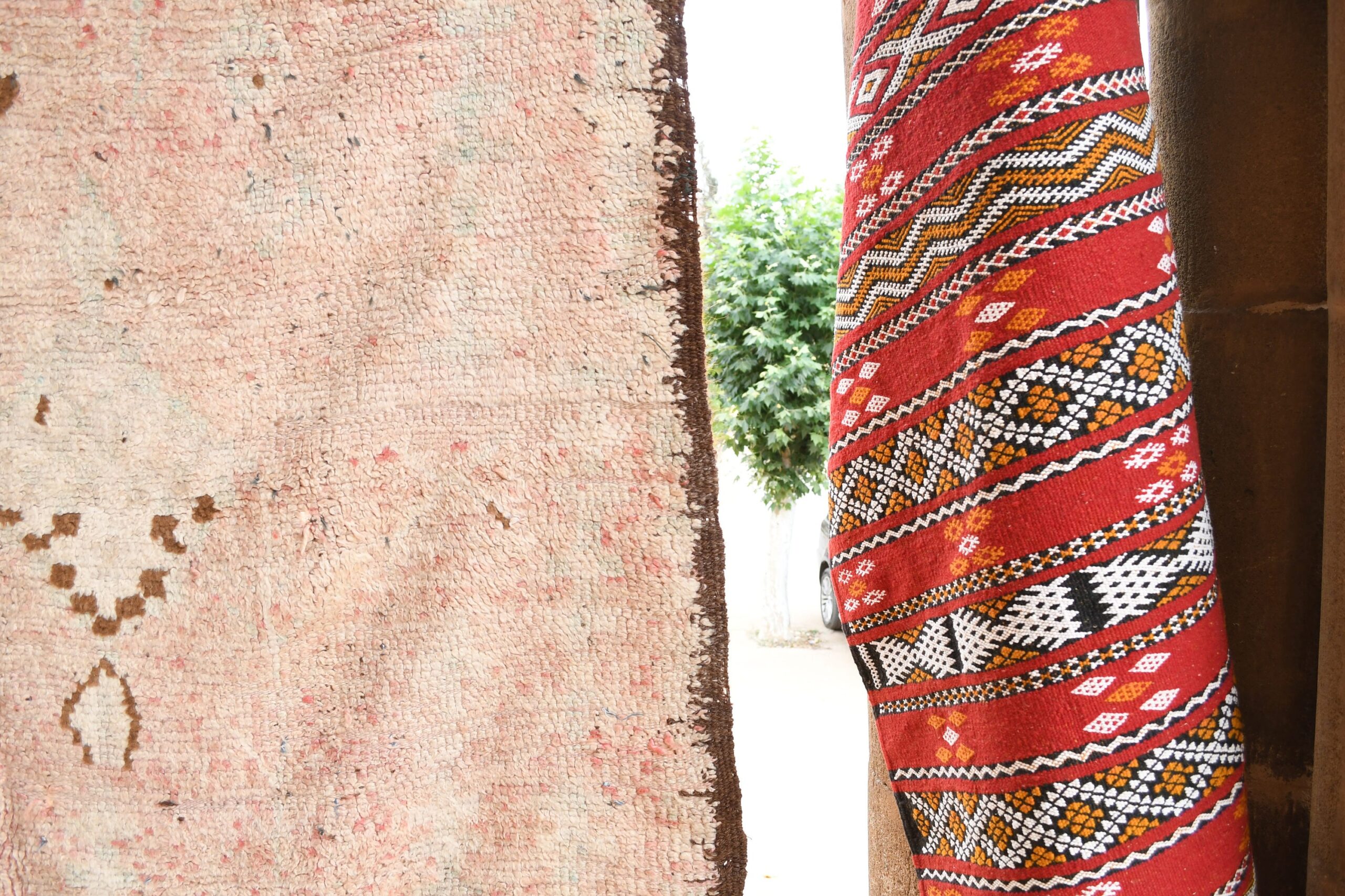 a red and white moroccan rug. il_fullxfull.6065553637_q1a2.jpg