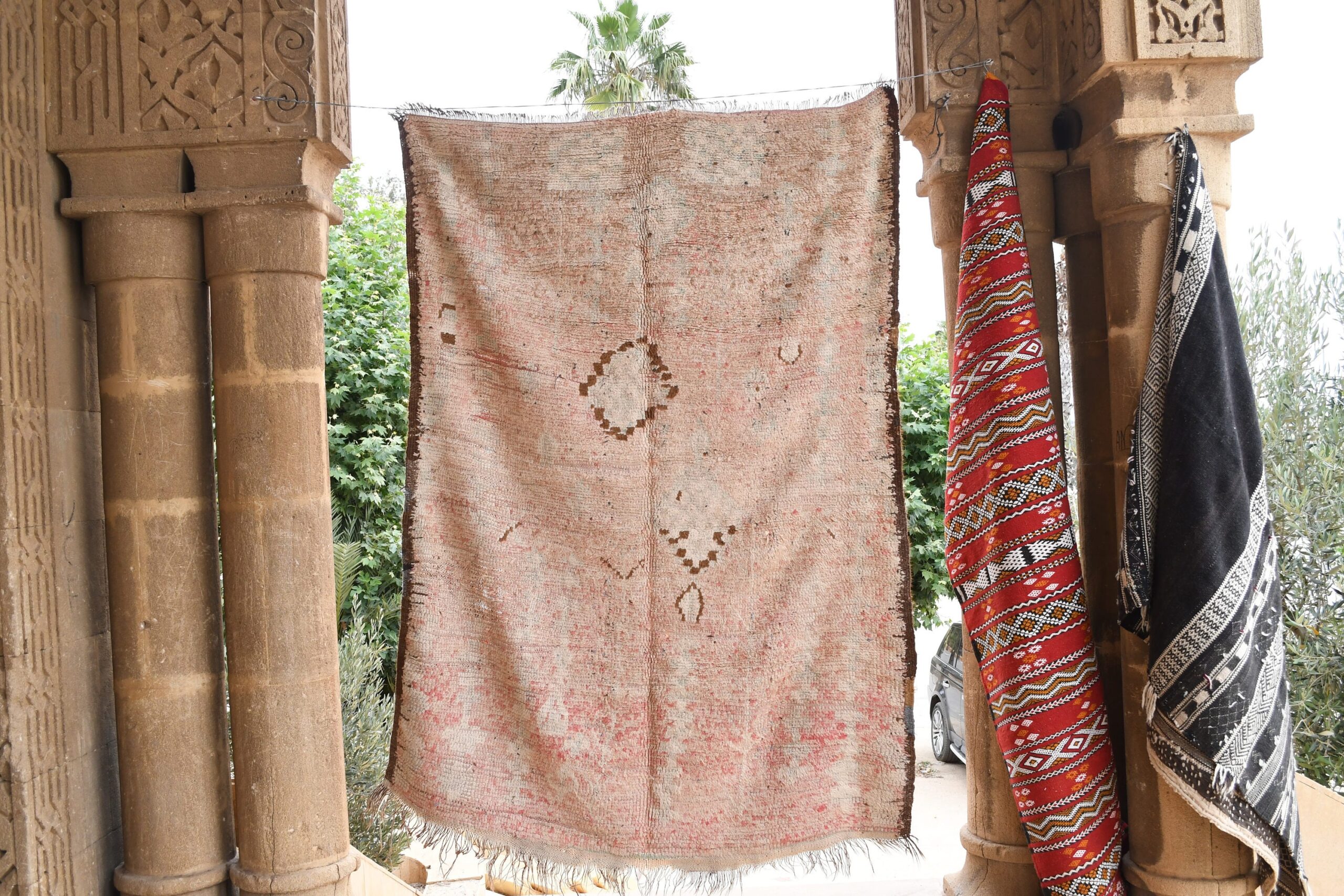 a red and white rug hanging on a wall. il_fullxfull.6065554155_92o0.jpg