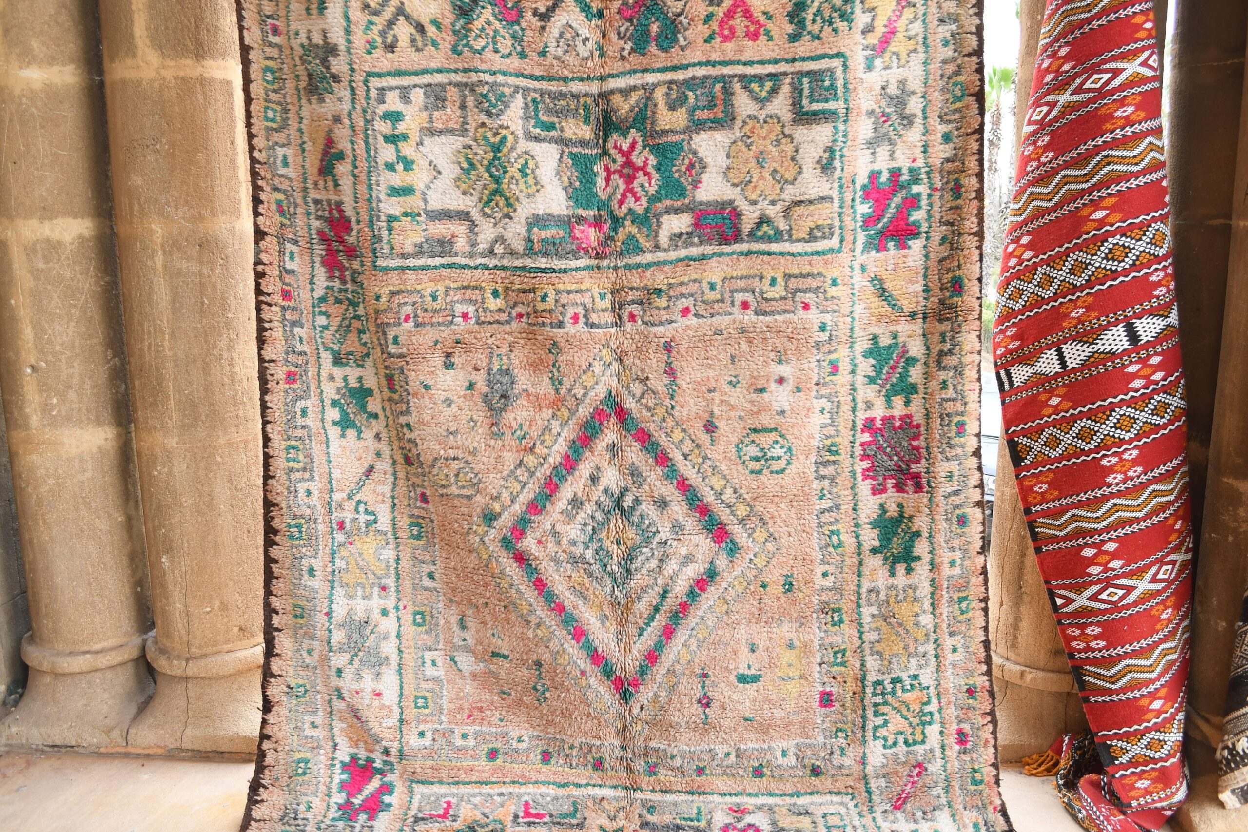 a large antique persian rug. il_fullxfull.6065555315_fbee.jpg