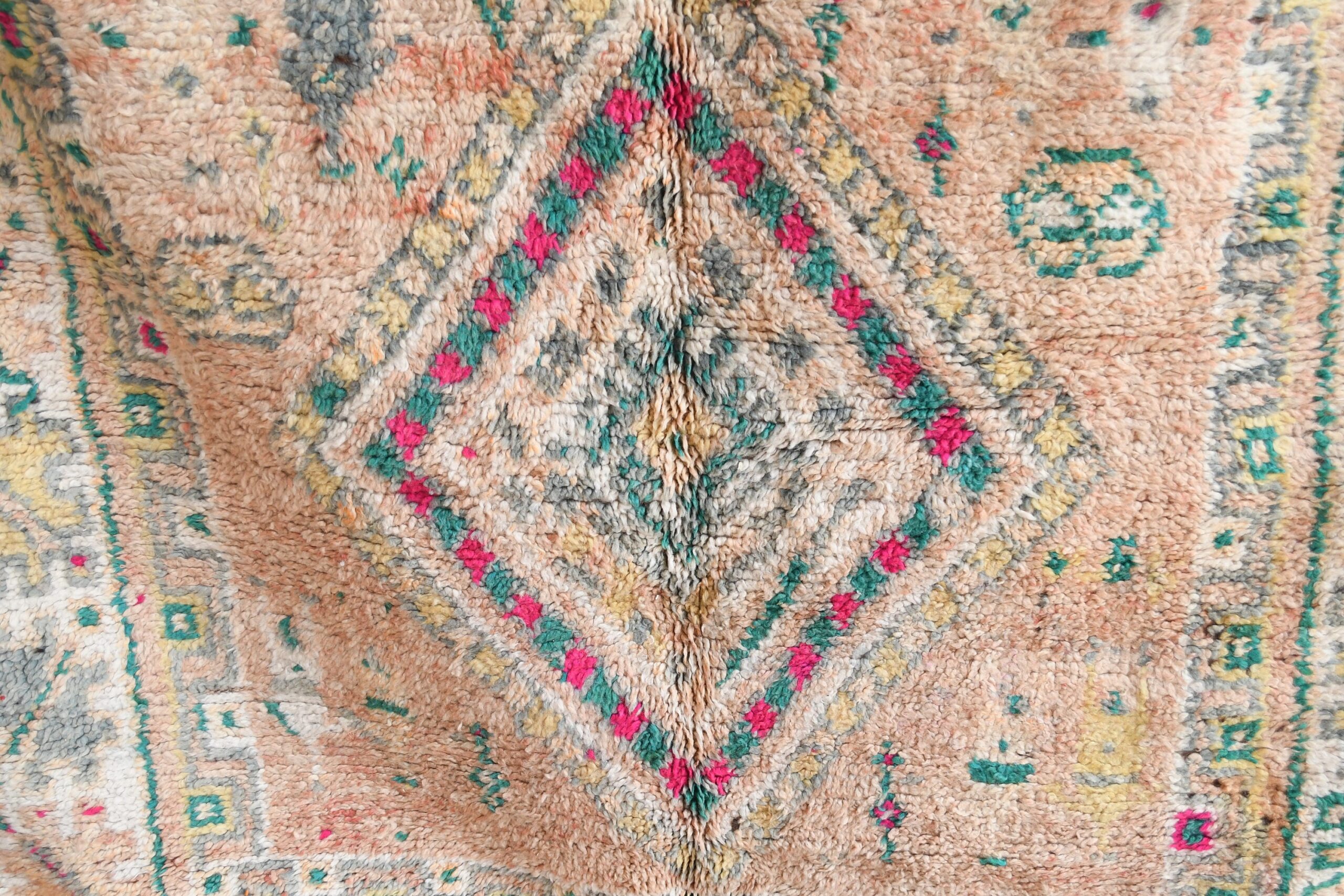 a rug with a colorful pattern on it. il_fullxfull.6065555763_7hj0.jpg