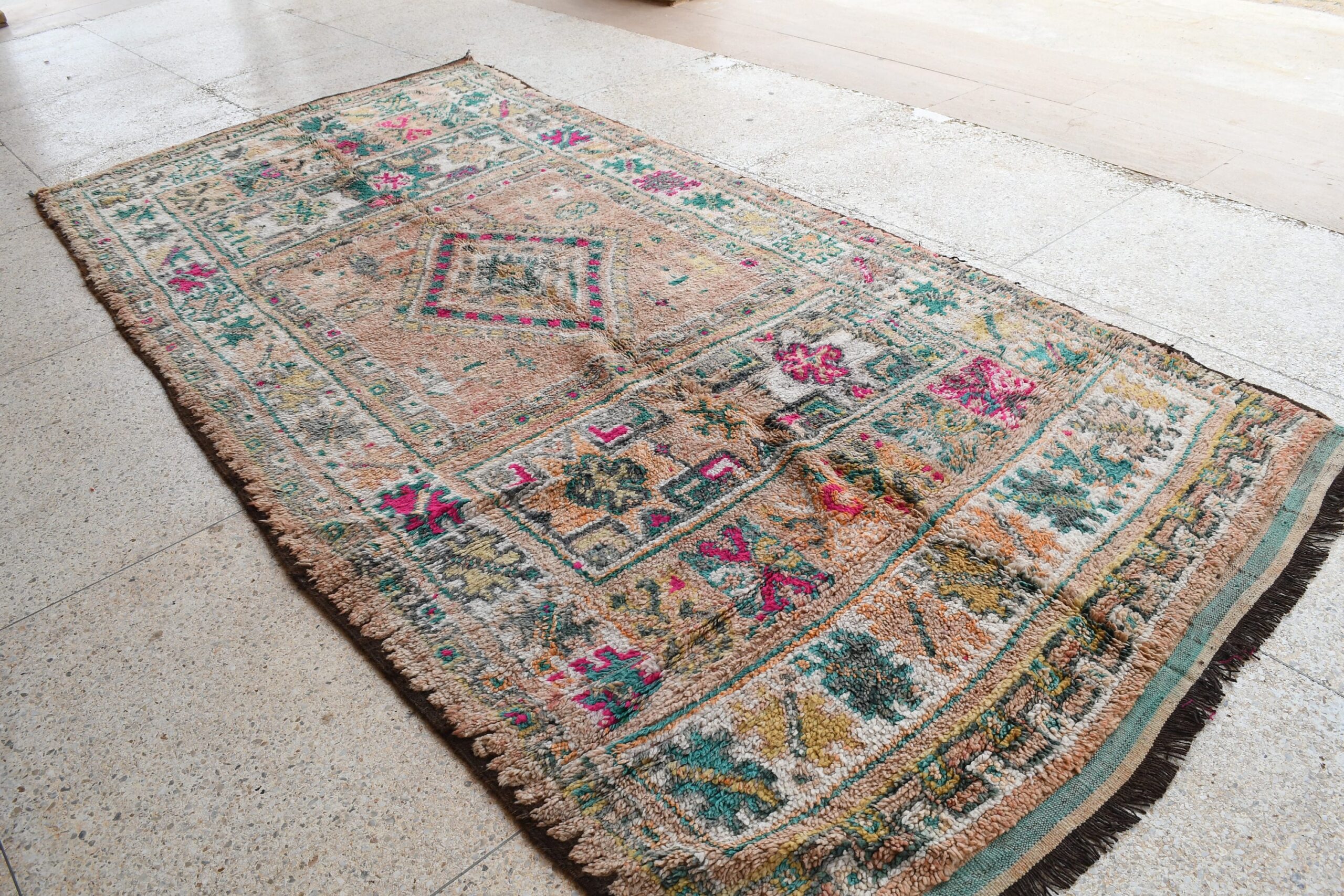 a colorful rug with a floral design on it. il_fullxfull.6065556295_k744.jpg