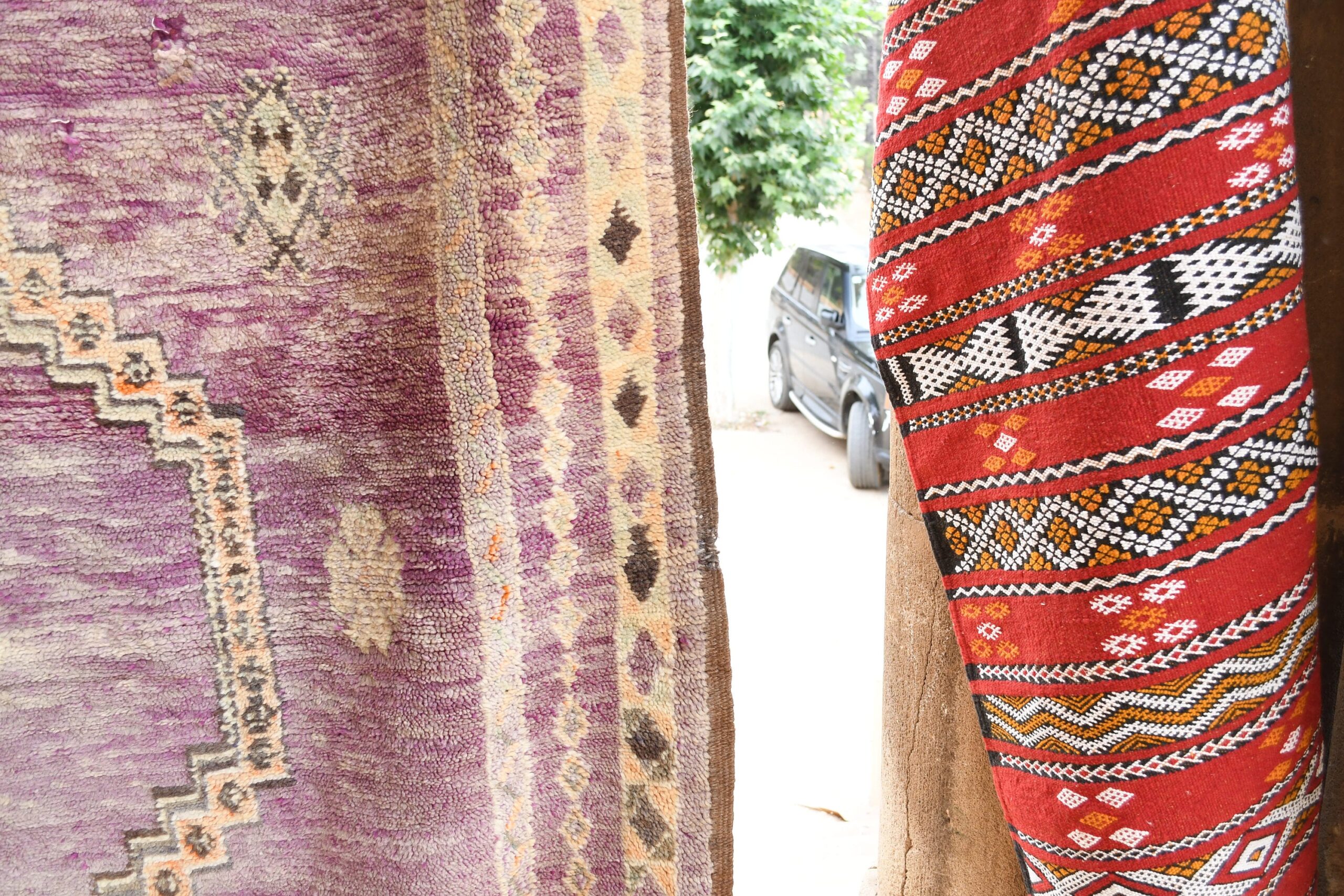 a colorful rug hanging on a wall. il_fullxfull.6065563715_2yub.jpg